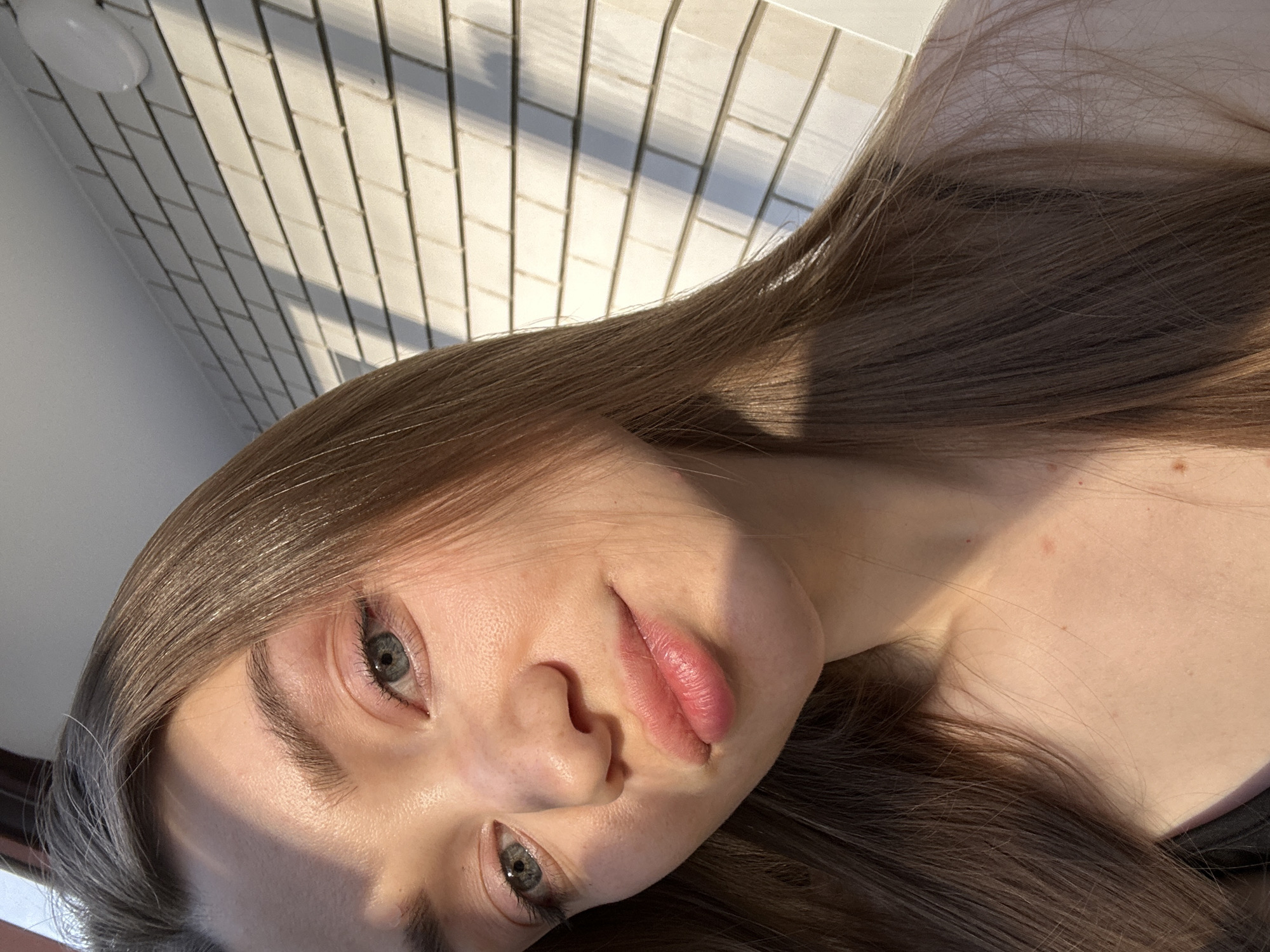 Portrait of young woman photographed in sunlight, Kazan