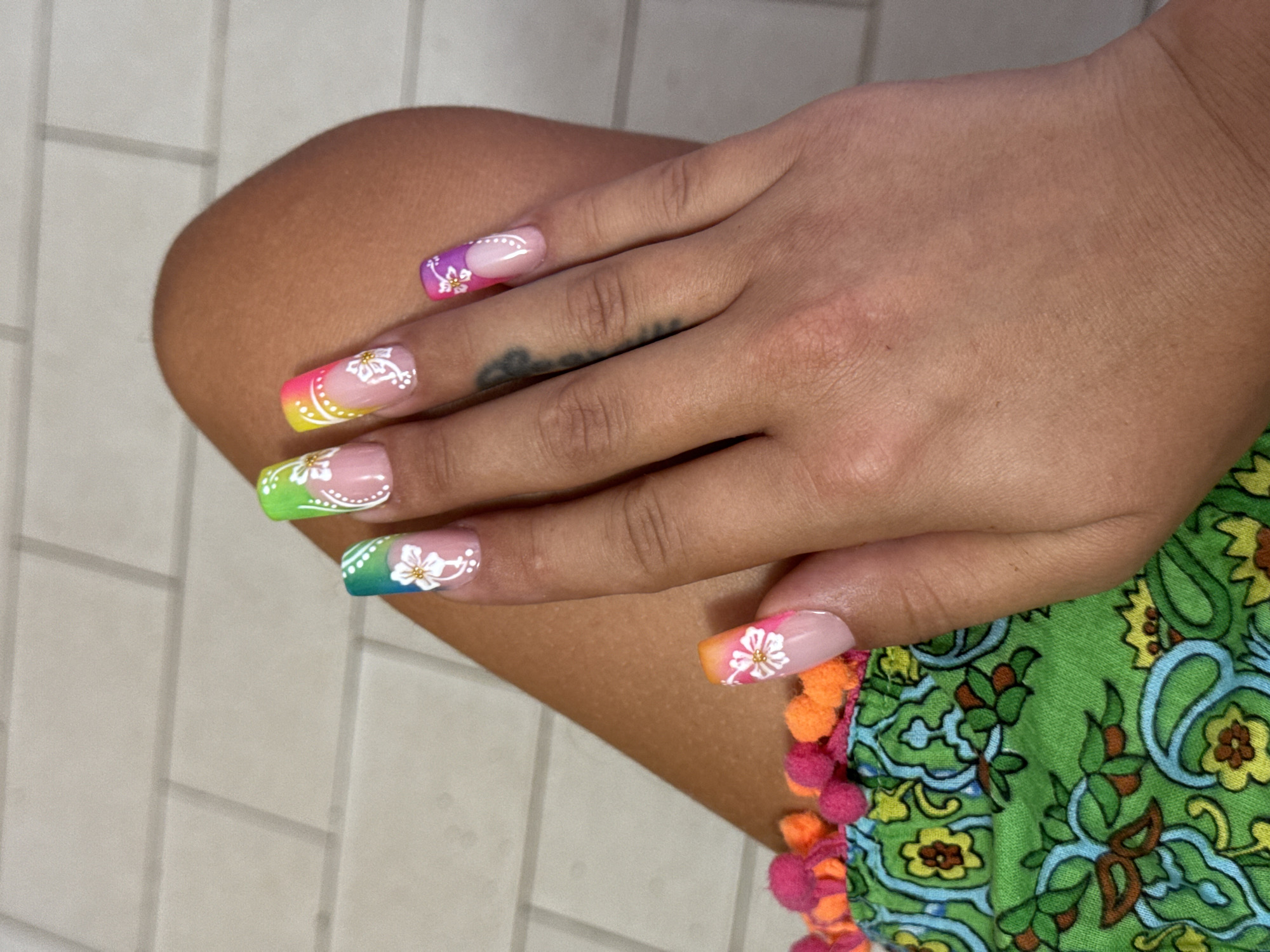 French Bulldogs and rainbow nails at home in coastal Italy