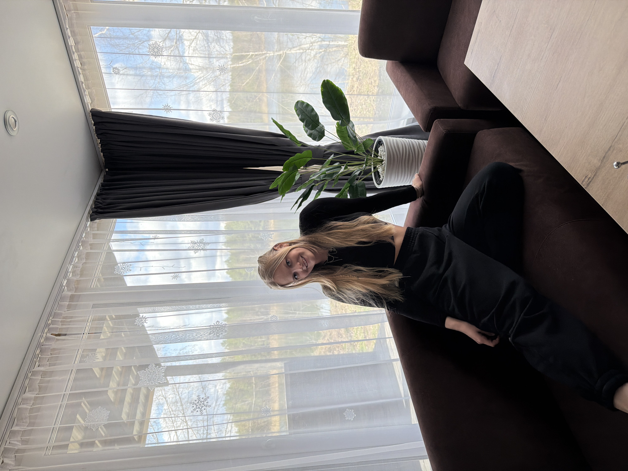 Woman's morning activities captured indoors and by lake in Novyi