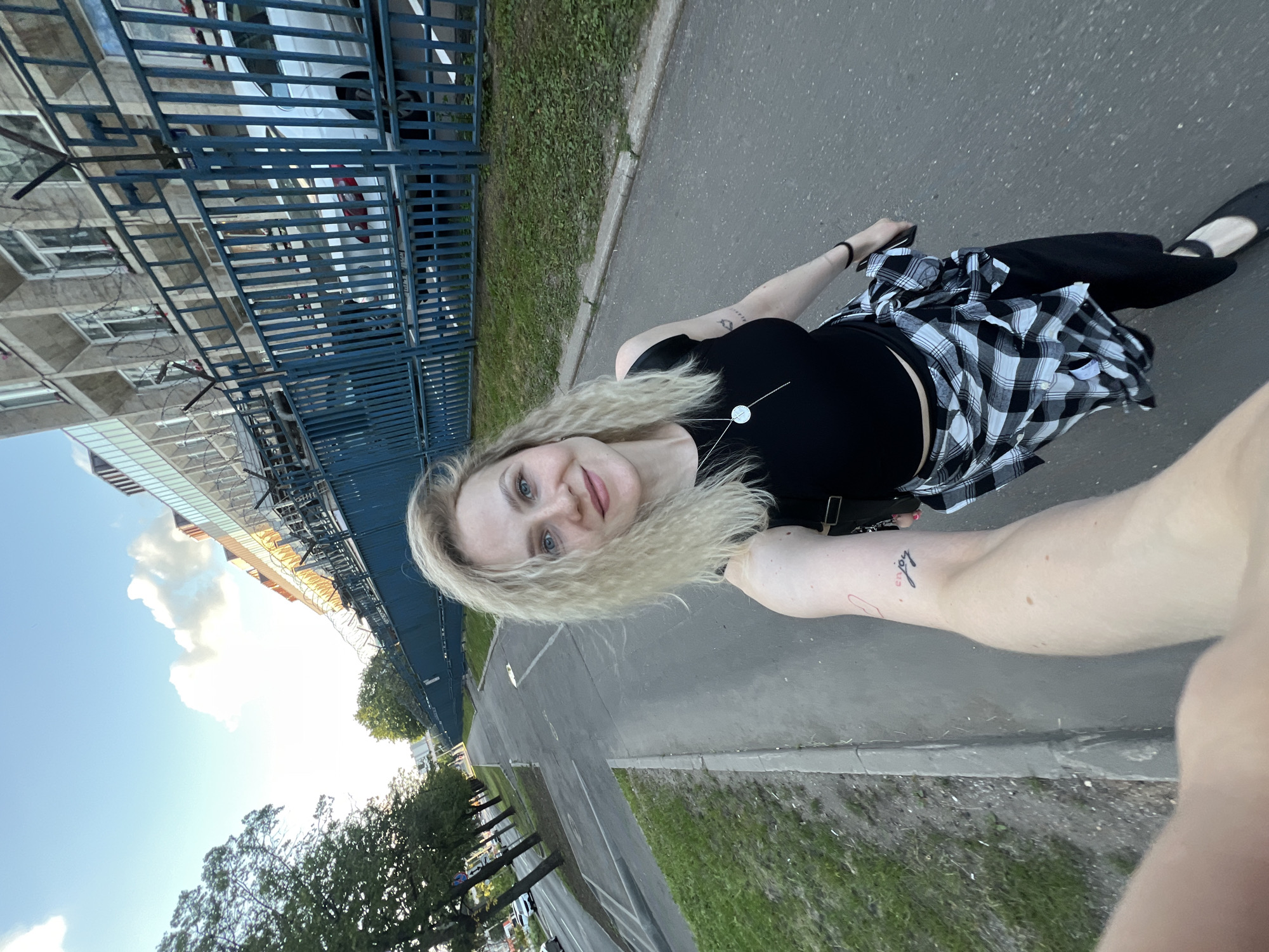 Selfie session outside modern buildings in Khimki, Russia