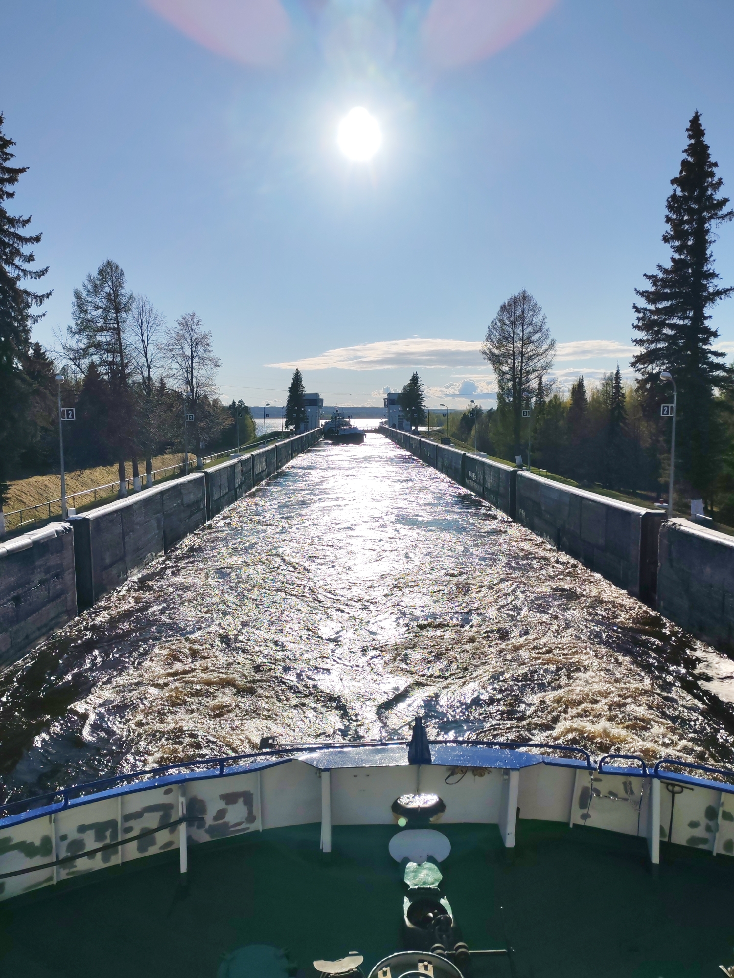 Vessel transits canal lock in Belousovo, Russia