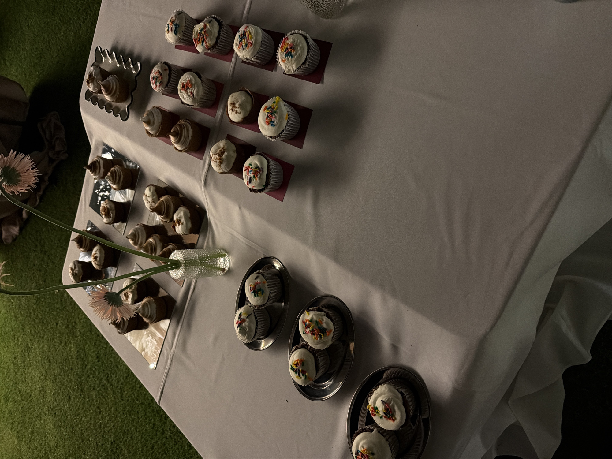 Cupcake display arranged at early morning event in Mexico