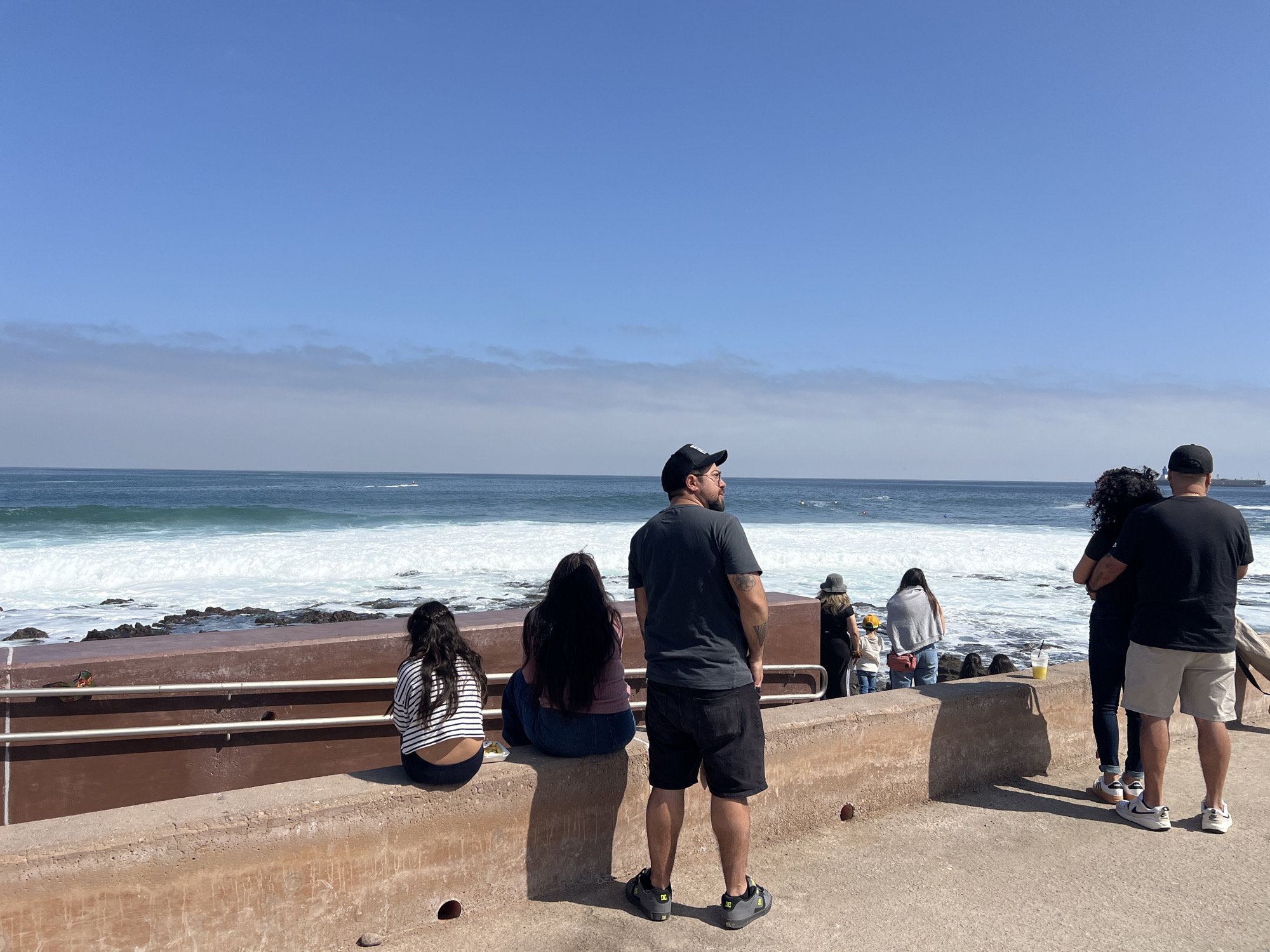 Arica's coastal promenade buzzing with afternoon activity