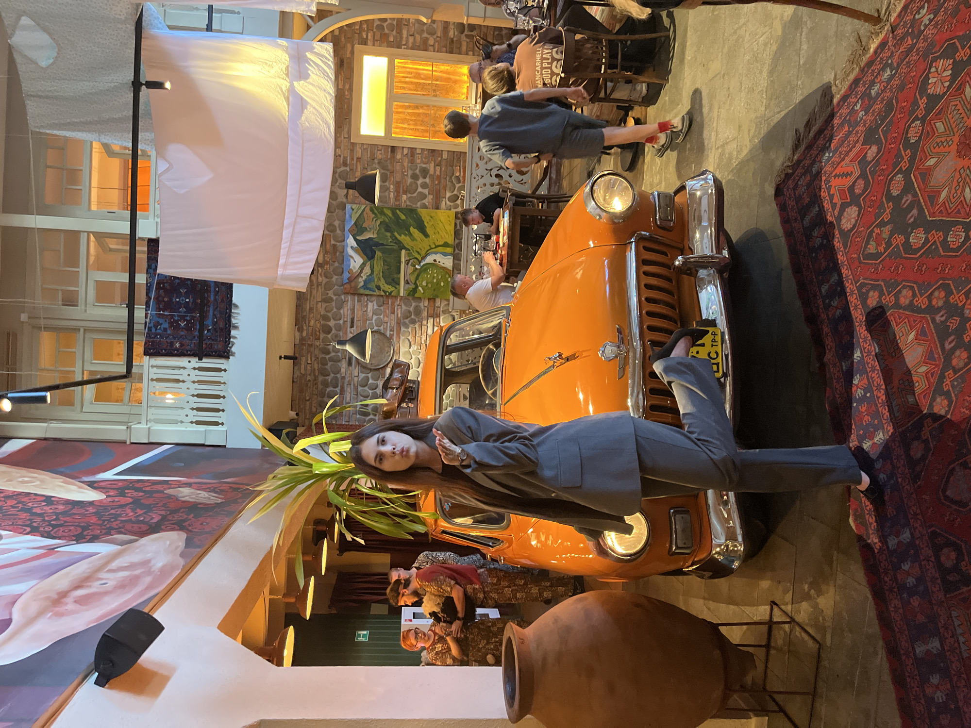 Lunch at an elaborately themed restaurant with a vintage car inside