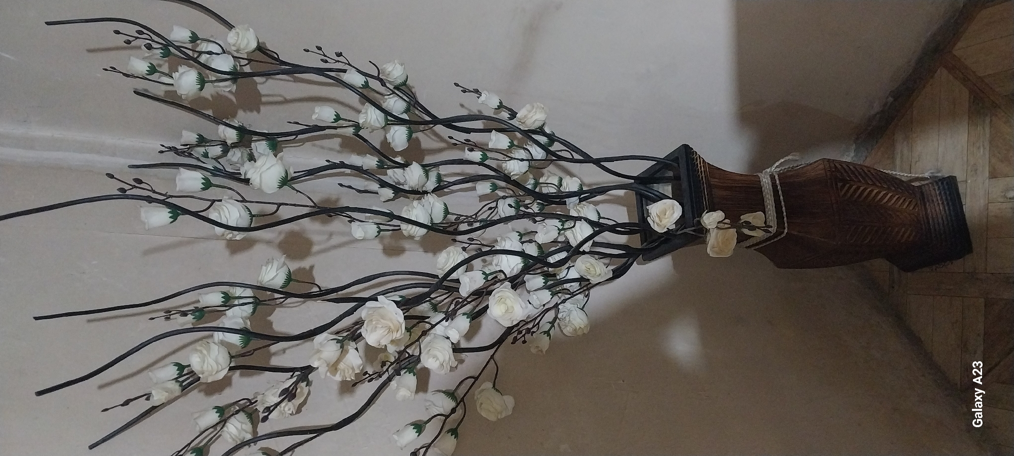 White rose arrangement displayed in decorated vase in Armenia