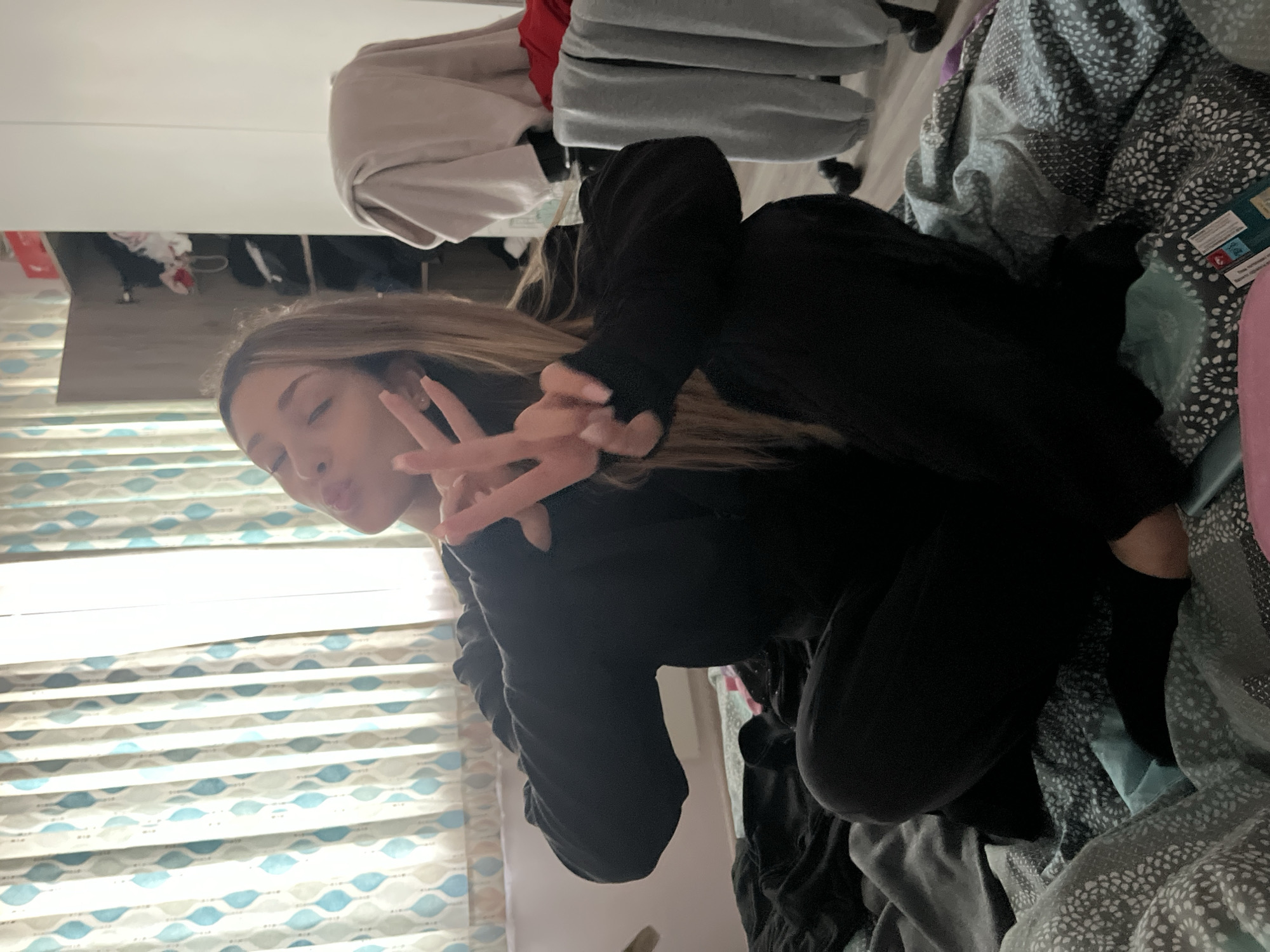 Woman poses for indoor photo in Varna bedroom