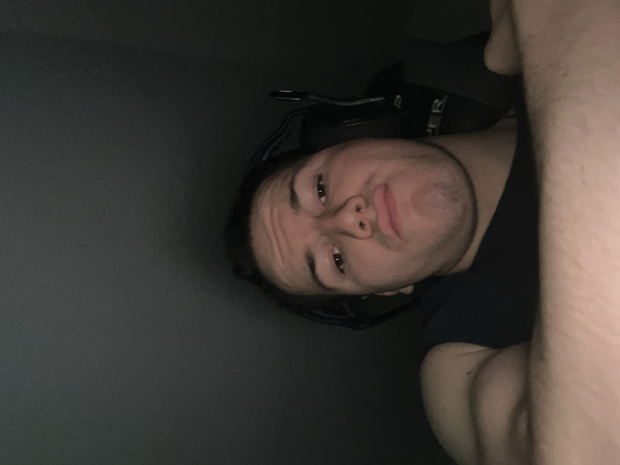 Young man in headset photographed in Benningen