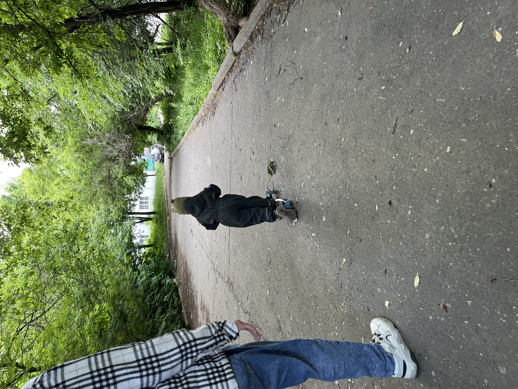Family documents toddler's playground visit and pet play in Chaikovsky