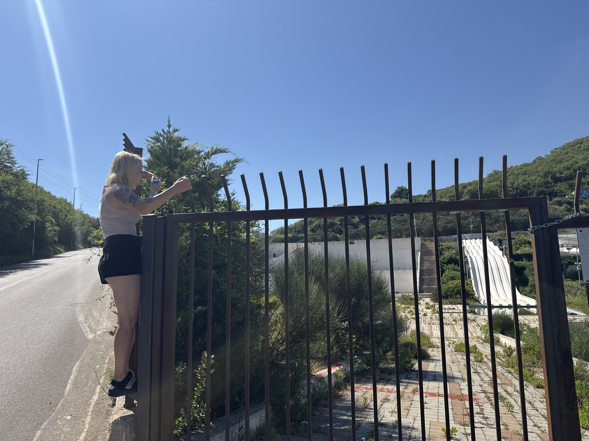 Woman visits abandoned Top Hill water park in Montenegro