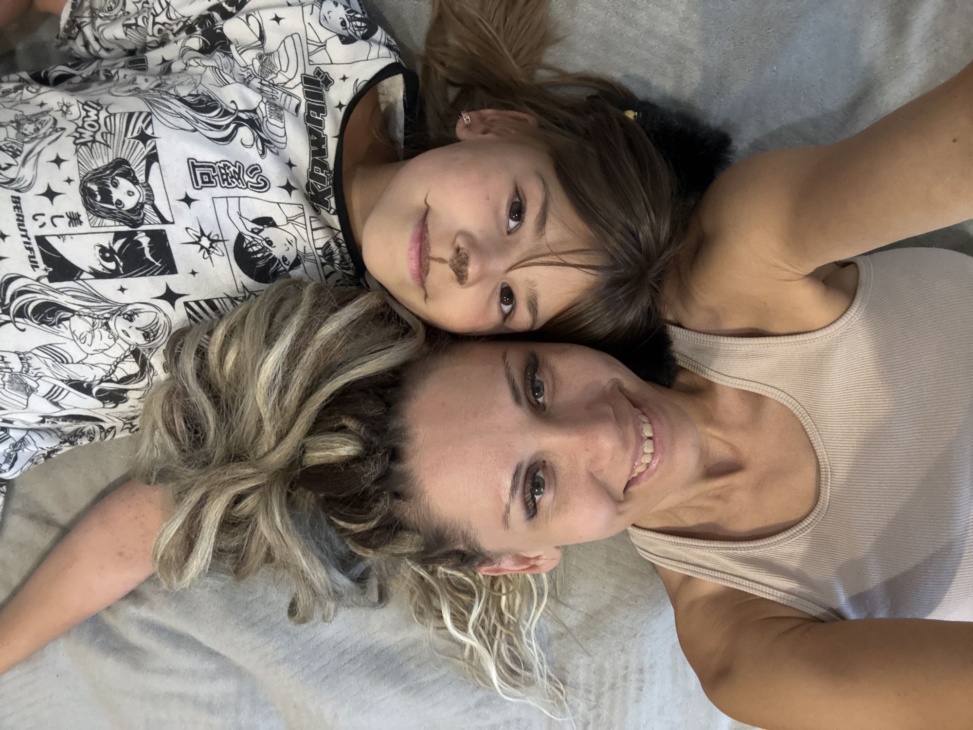 Casual close-up selfies, two angles, one relaxed moment.