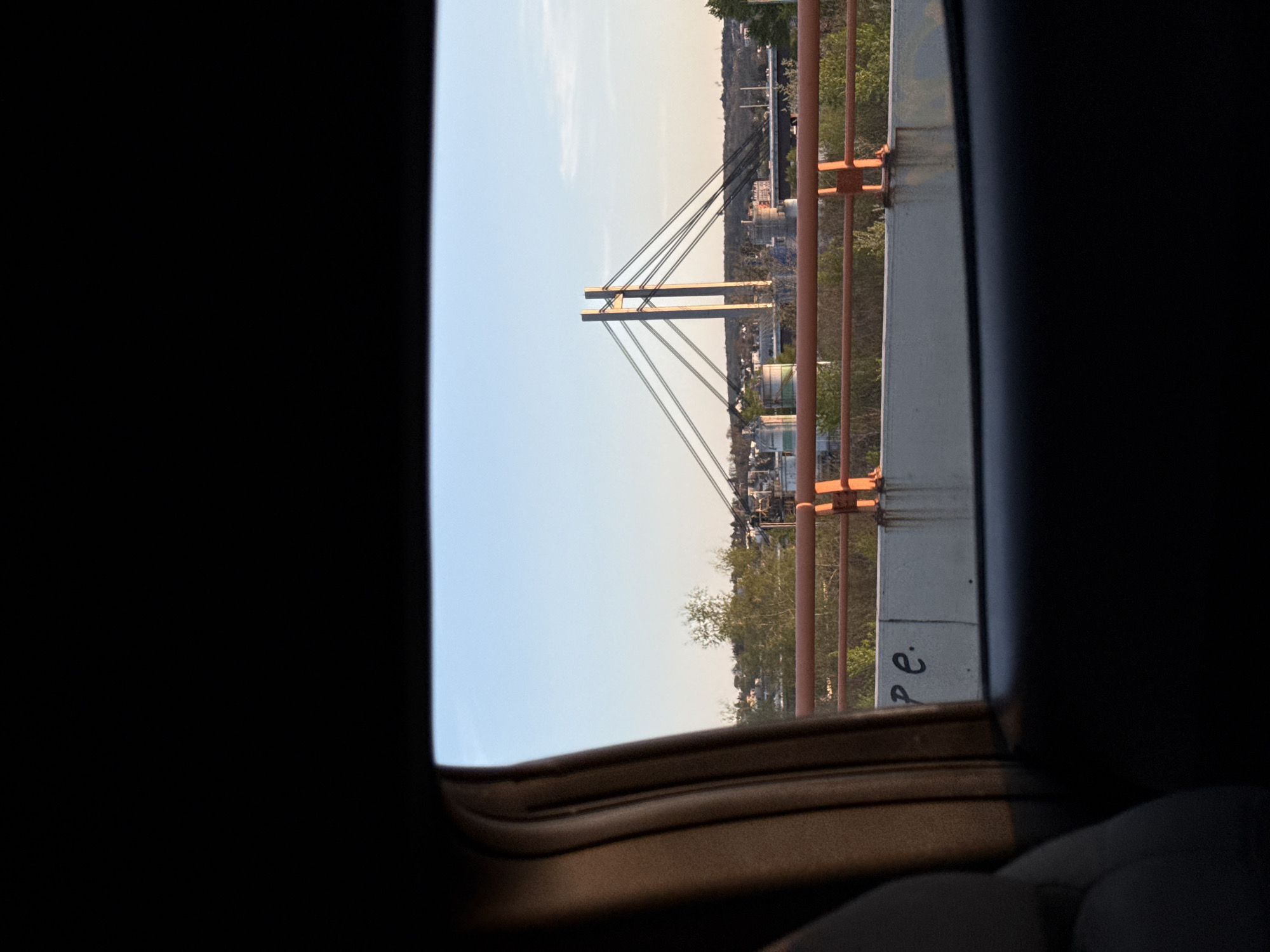Vehicle passenger photographs cable-stayed bridge in Belgrade