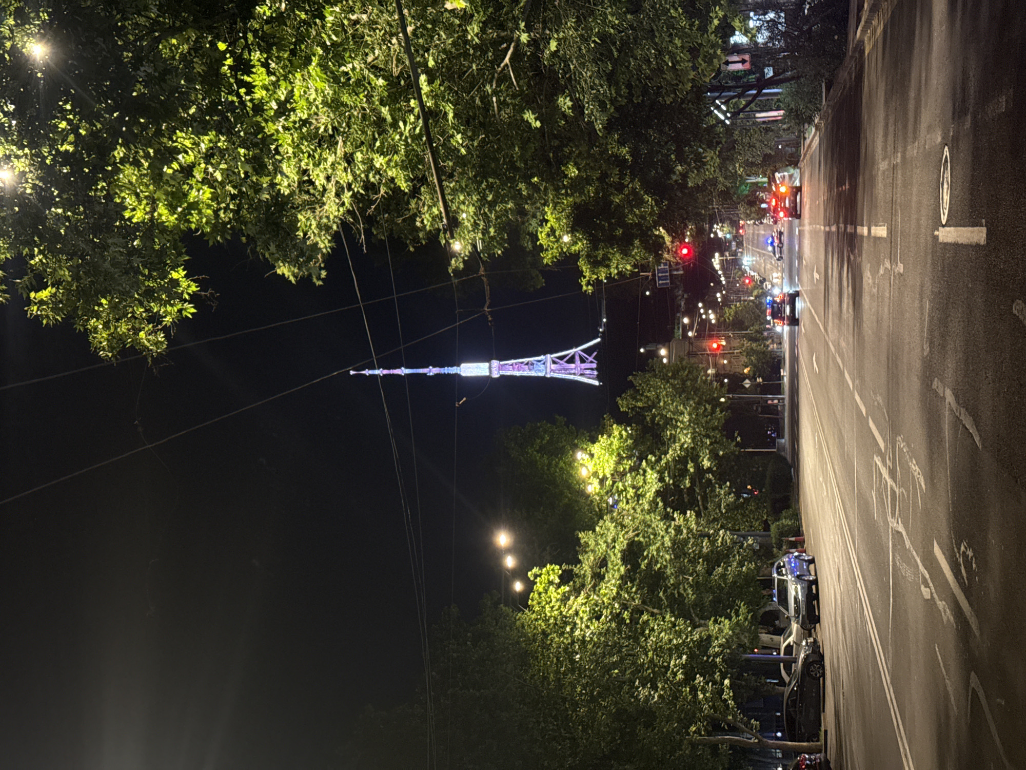 Illuminated Yerevan TV Tower captured in nighttime street view