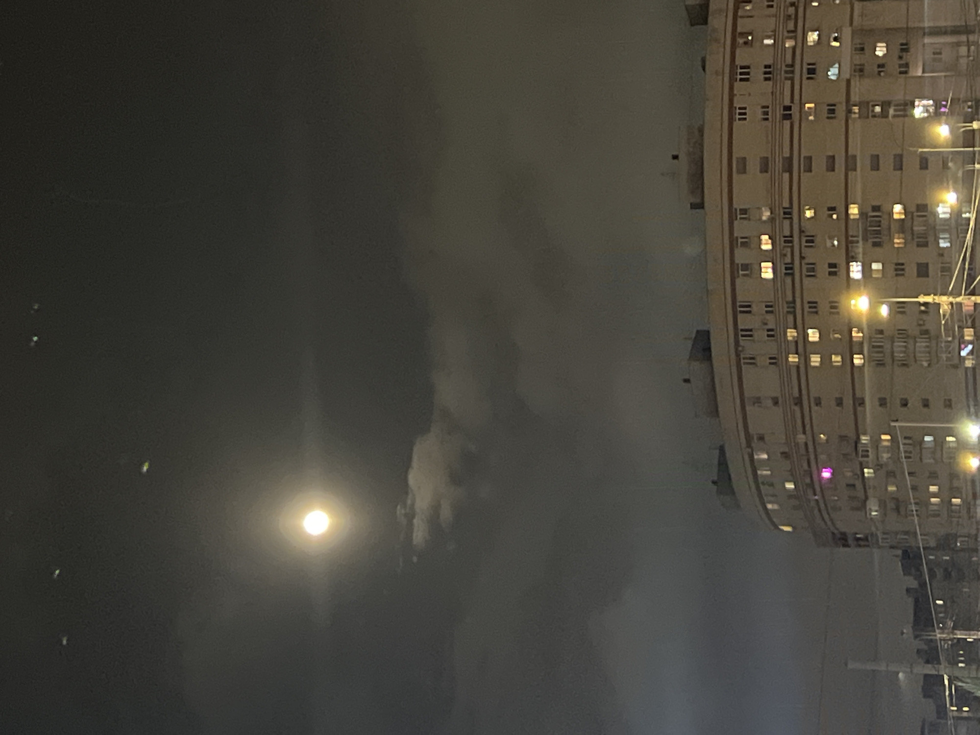 Evening scenes captured in Shushary: moonlit building, uniformed official