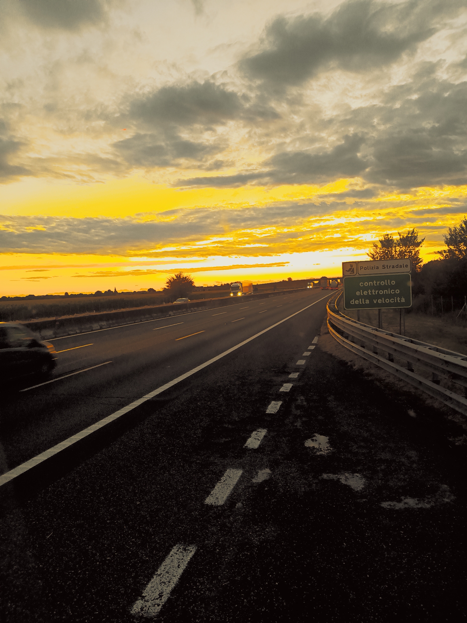 Striking highway sunset near Somaglia, Italy