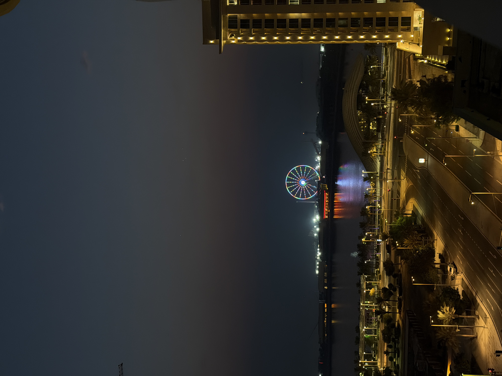 Lusail city lights at night, Ferris wheel and skyline