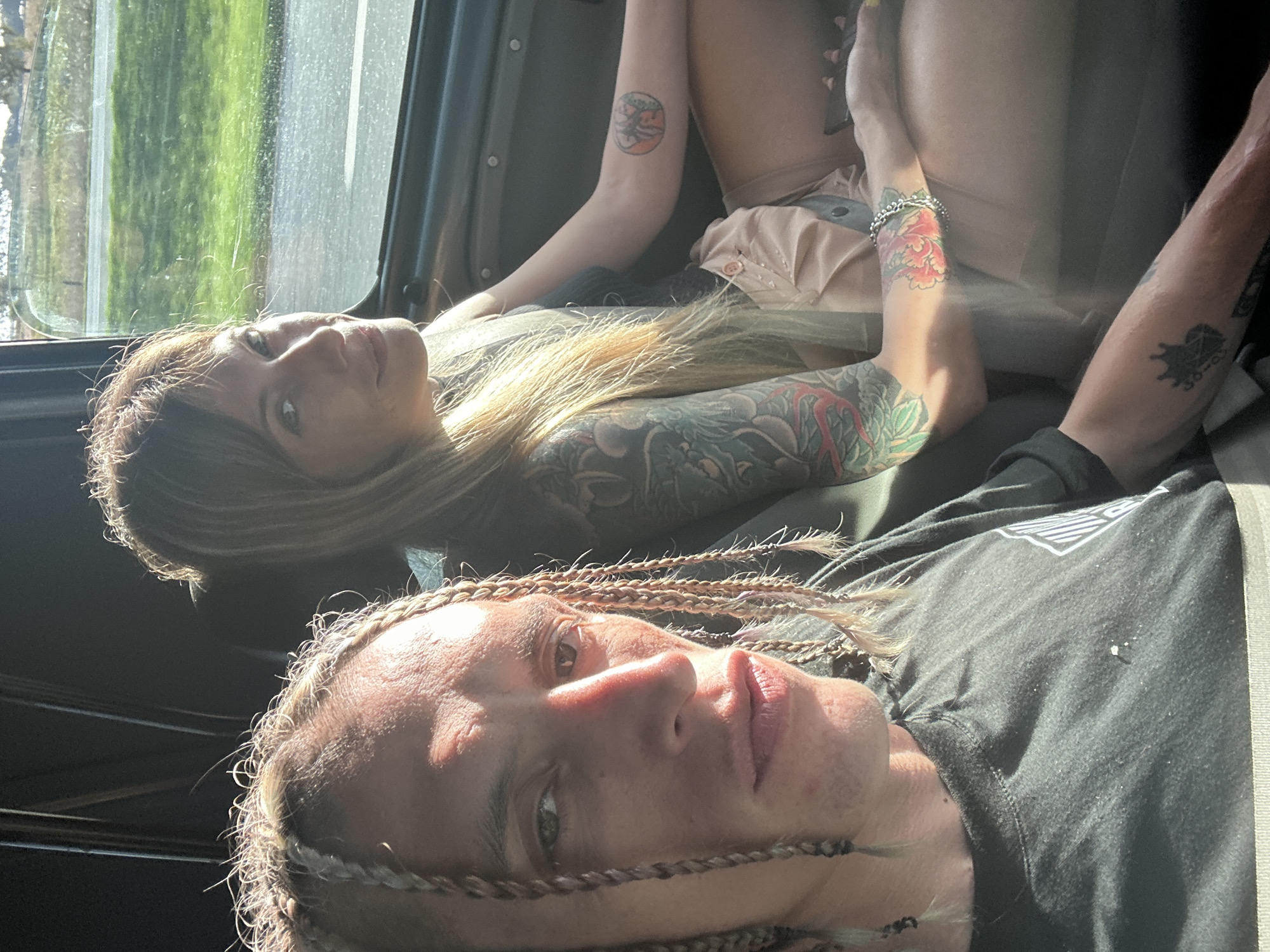 Two people rest inside vehicle in Argentina