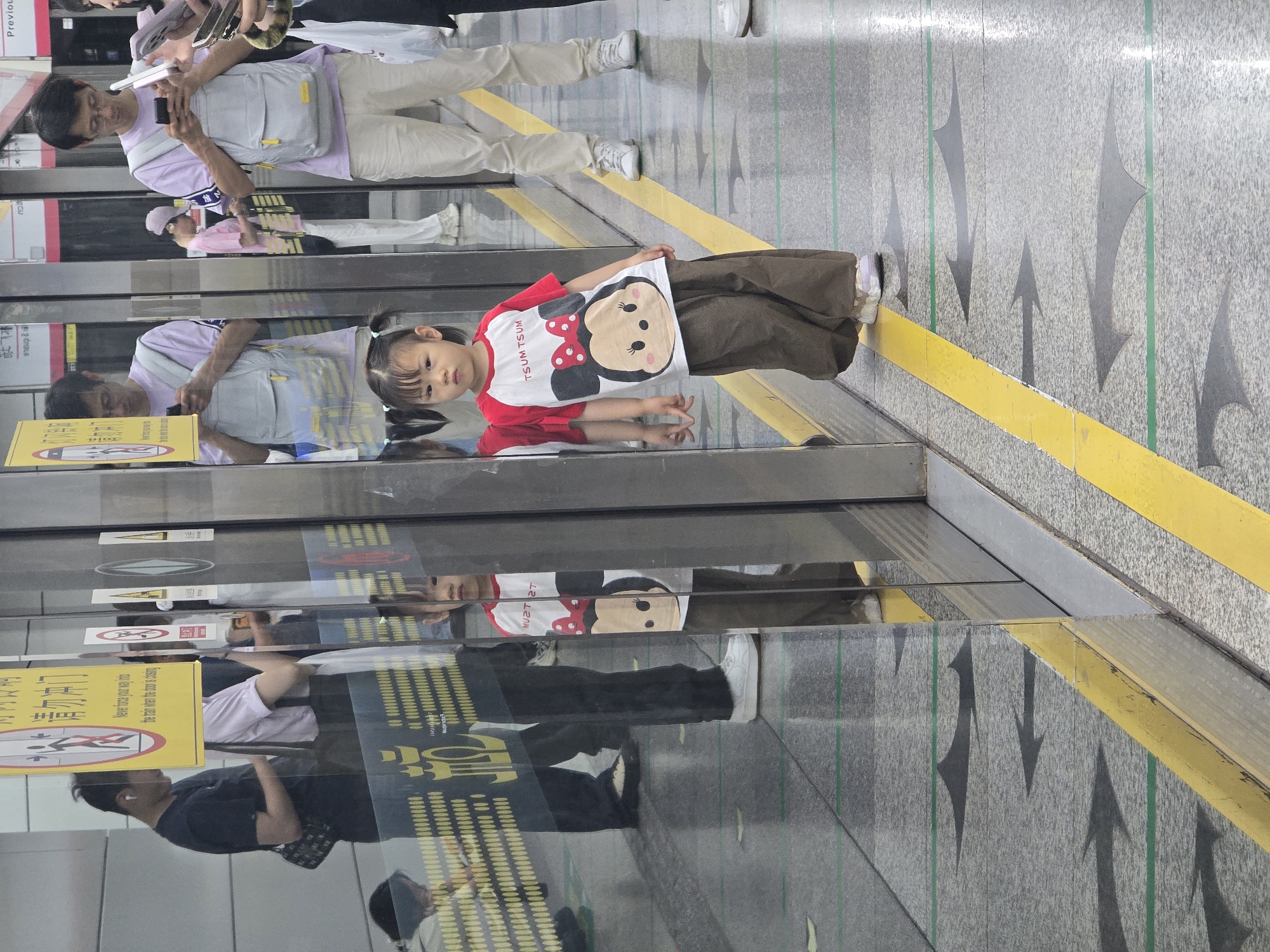 Morning commuters navigate Hangzhou Metro stations during rush hour