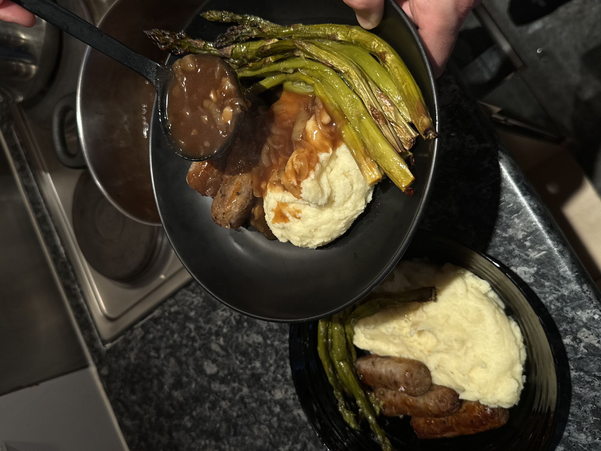 London resident serves traditional sausage and mash dinner