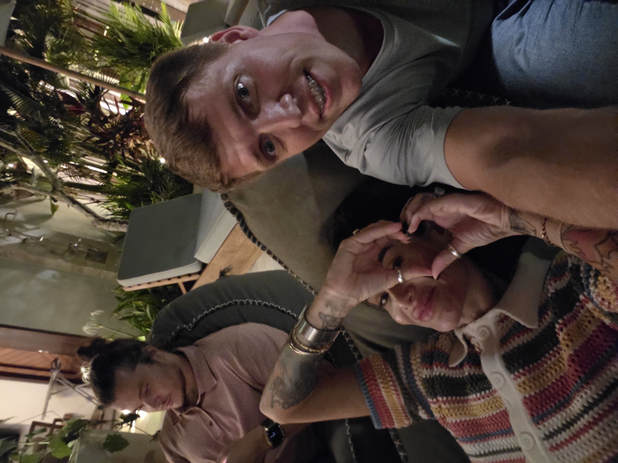 Tourist group documents social gathering through selfies in Ubud