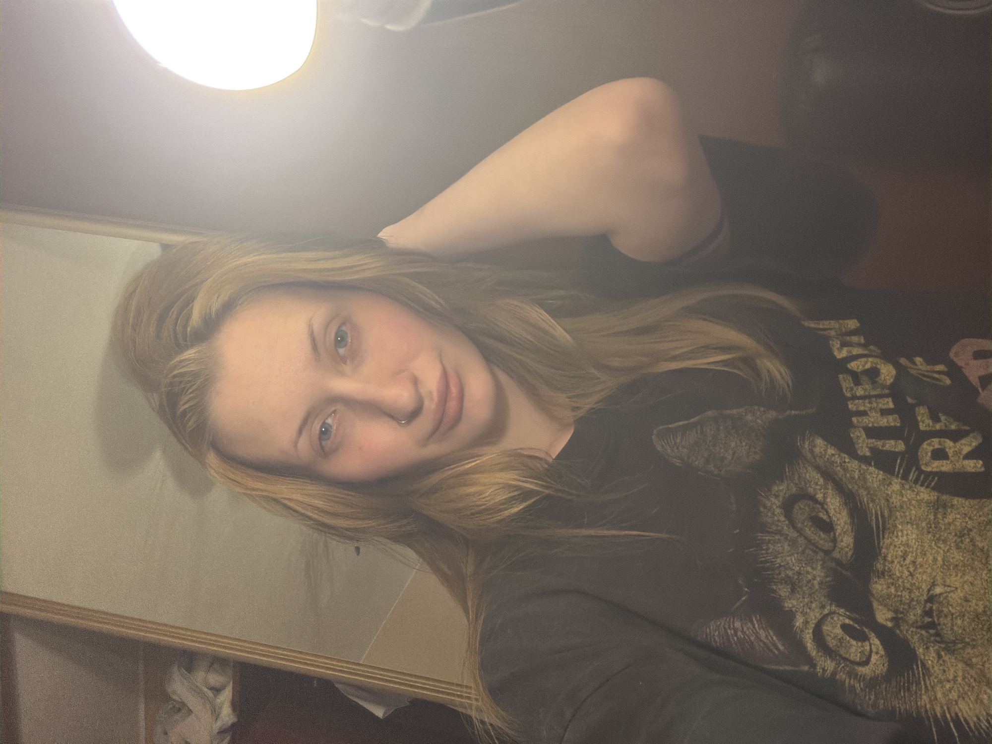 Back-to-back selfies in a dim room, Vaganovo