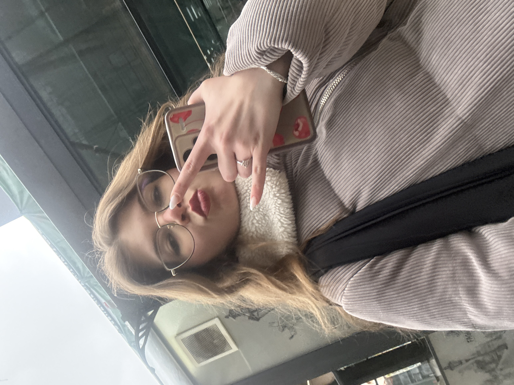 Woman takes selfie in Pernik, Bulgaria