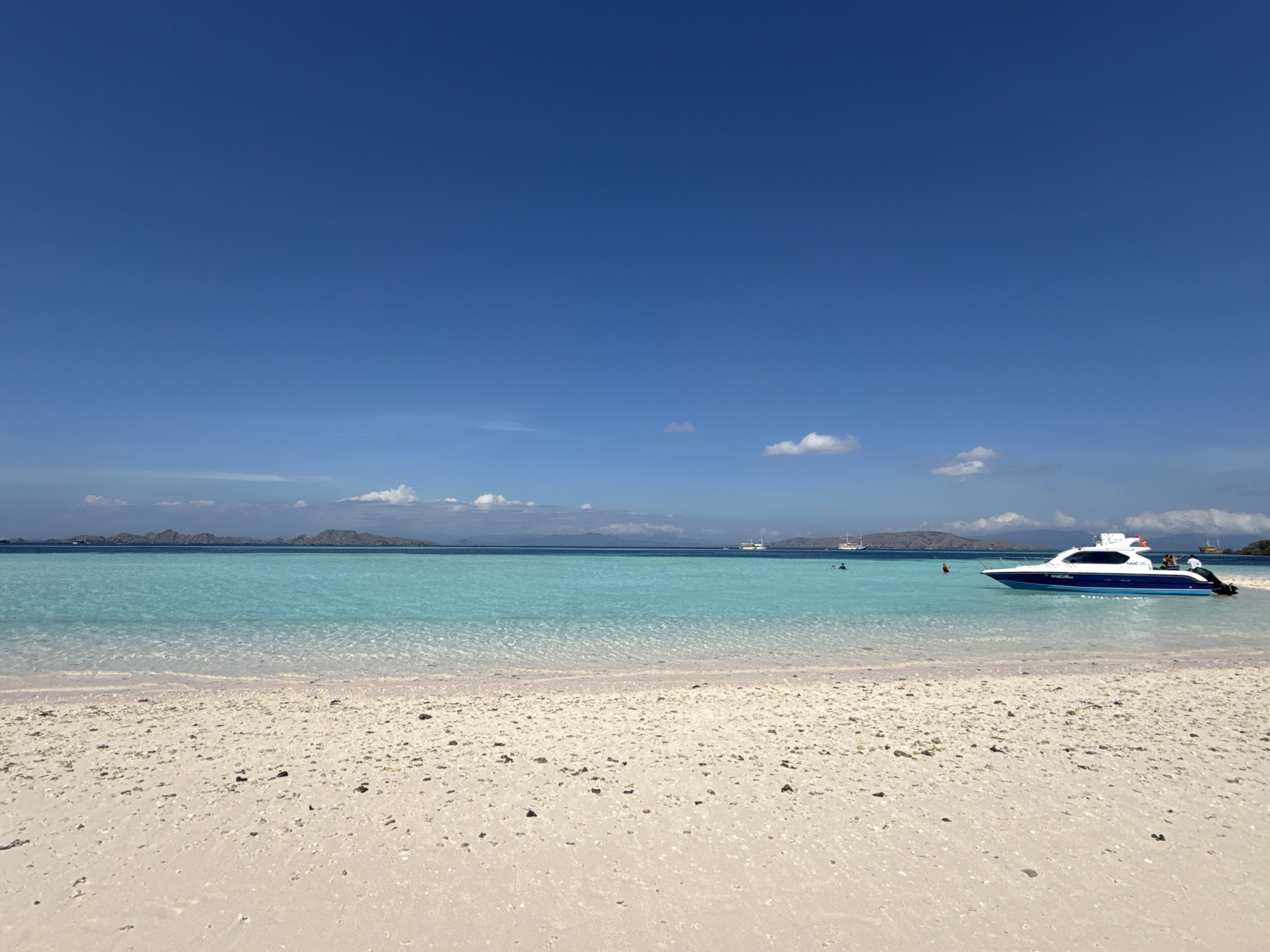 Beach activity documented at Komodo, Indonesia during morning hours