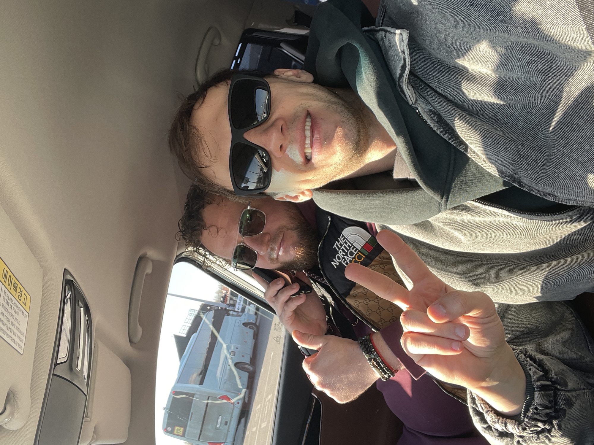 Morning car ride captured in Kudrovo with coffee stop