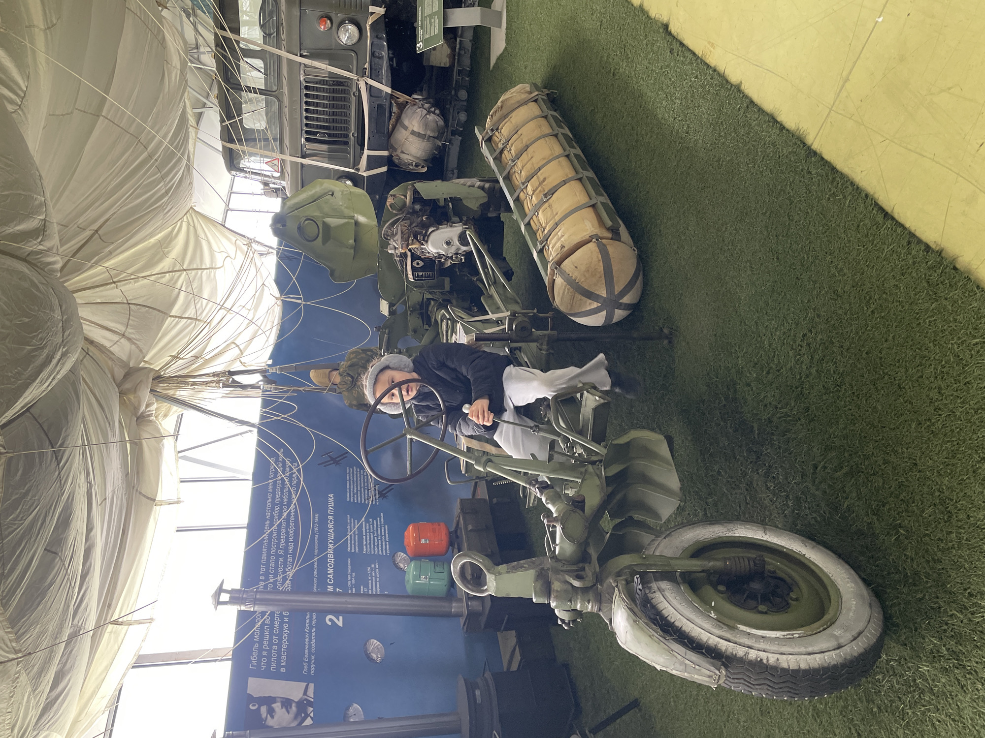 Museum visitor documents military and tech exhibits in Tolyatti