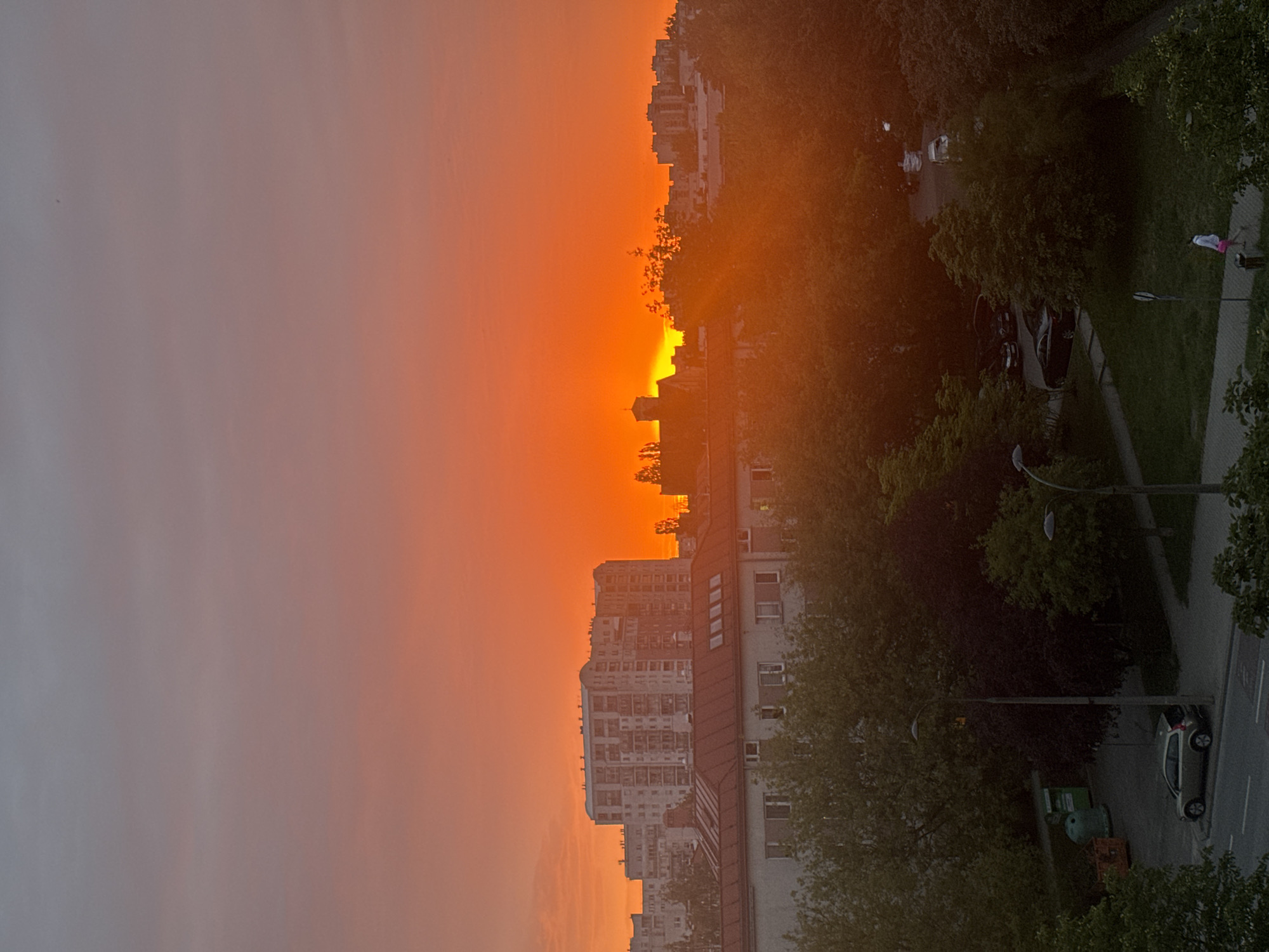 Warm sunset colors over Warsaw rooftops