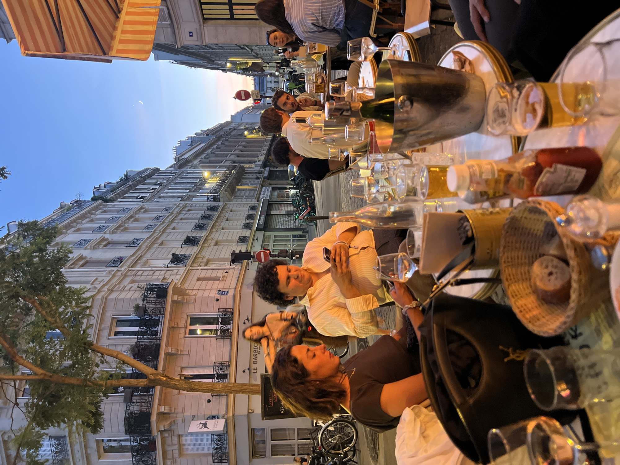 Twilight café evening on a classic Paris street