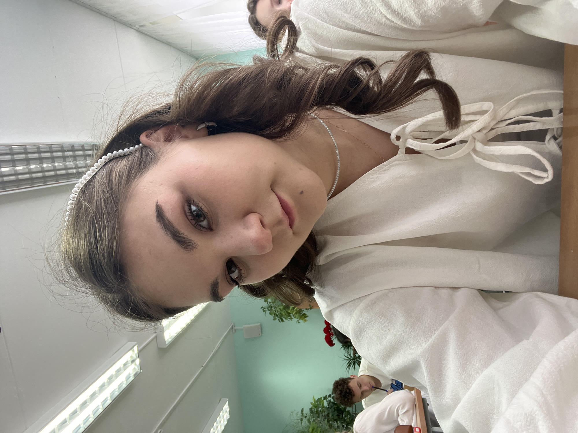Portrait of young woman in vintage attire captured in Chaikovsky