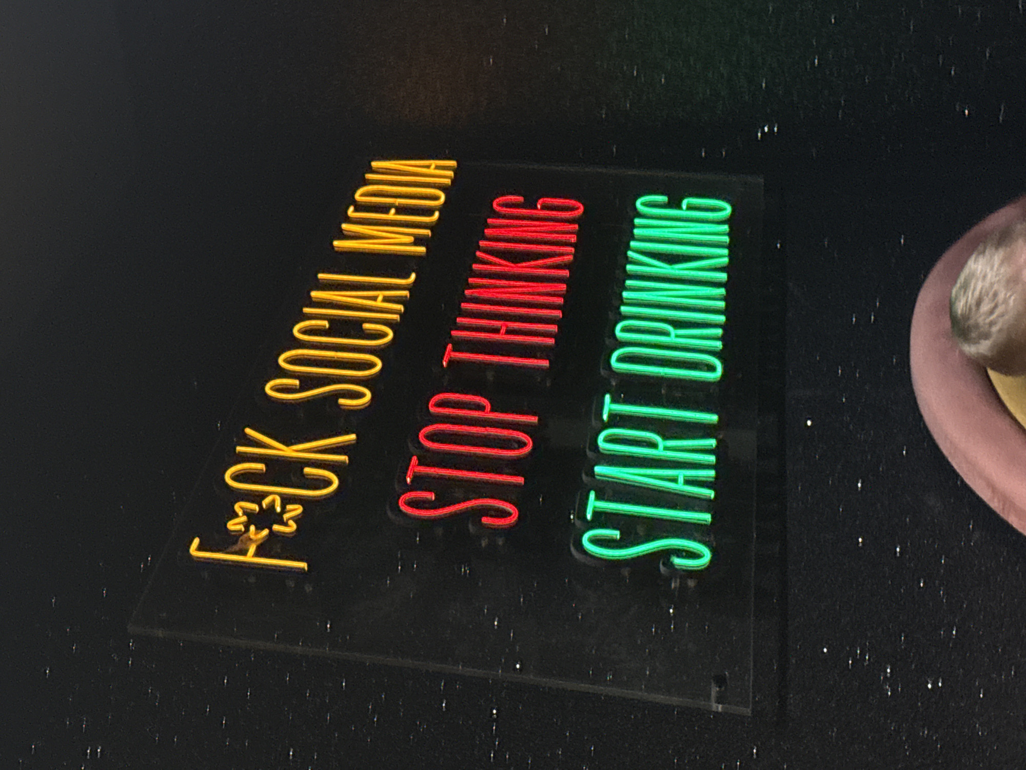 Night out captured at Plovdiv nightclub with neon signs