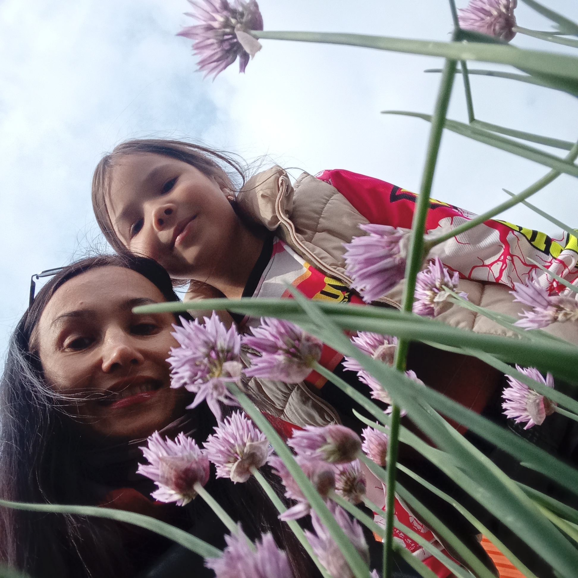 Mother and daughter enjoy afternoon activities in Pervomaysky, Russia
