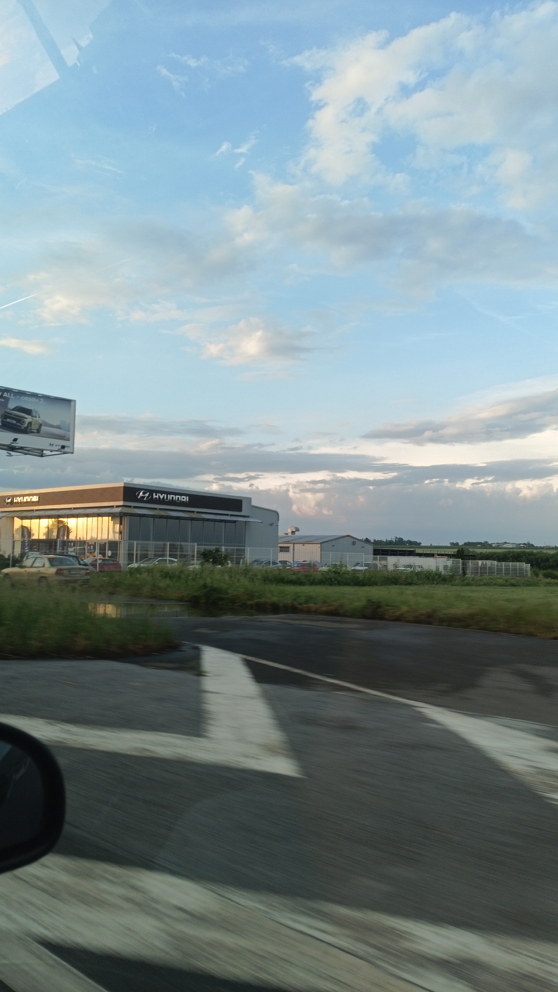 Vehicle passes commercial district in Burgas, Bulgaria