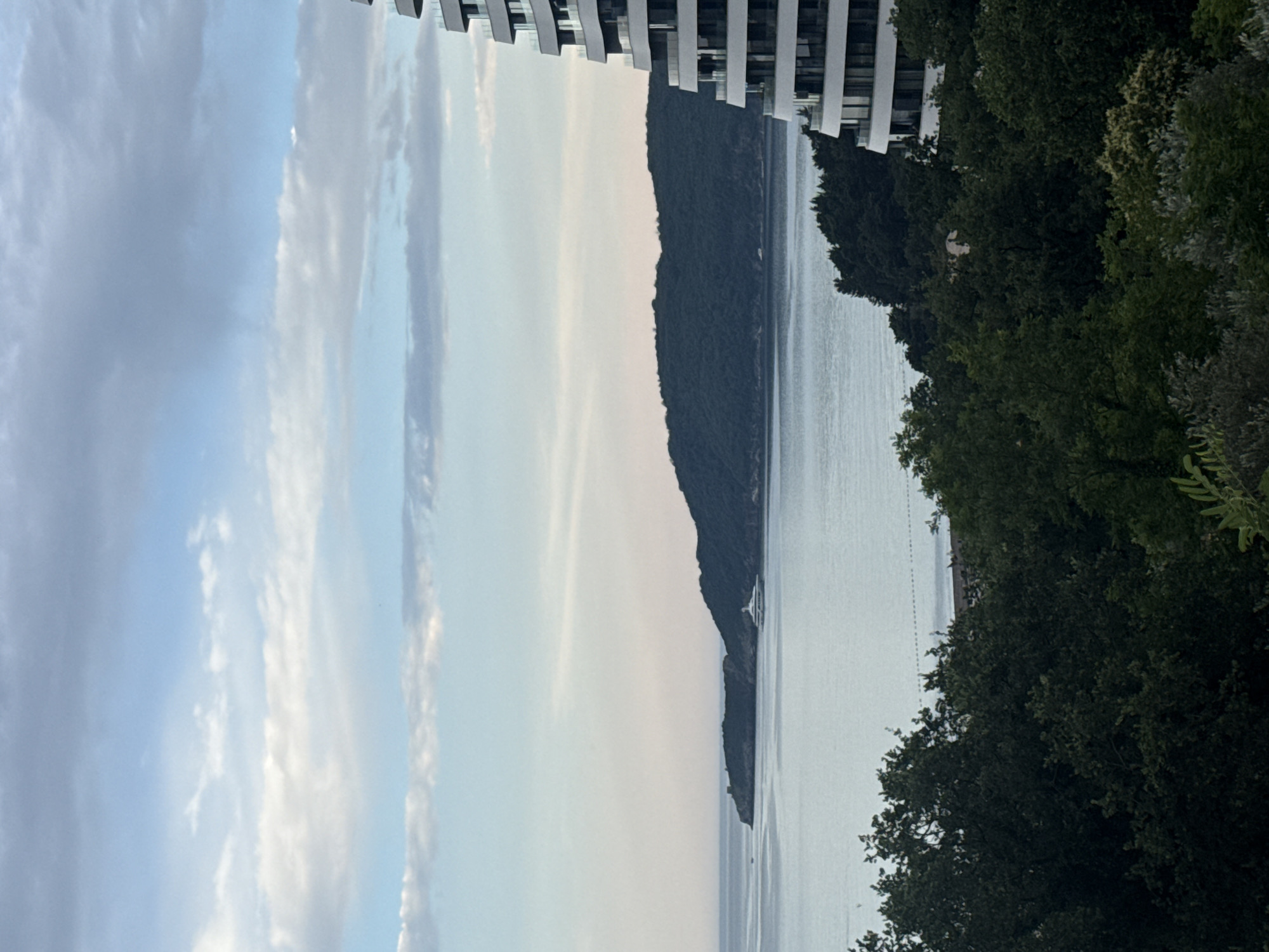Superyacht, cranes, and coastline life in Boreti, Montenegro