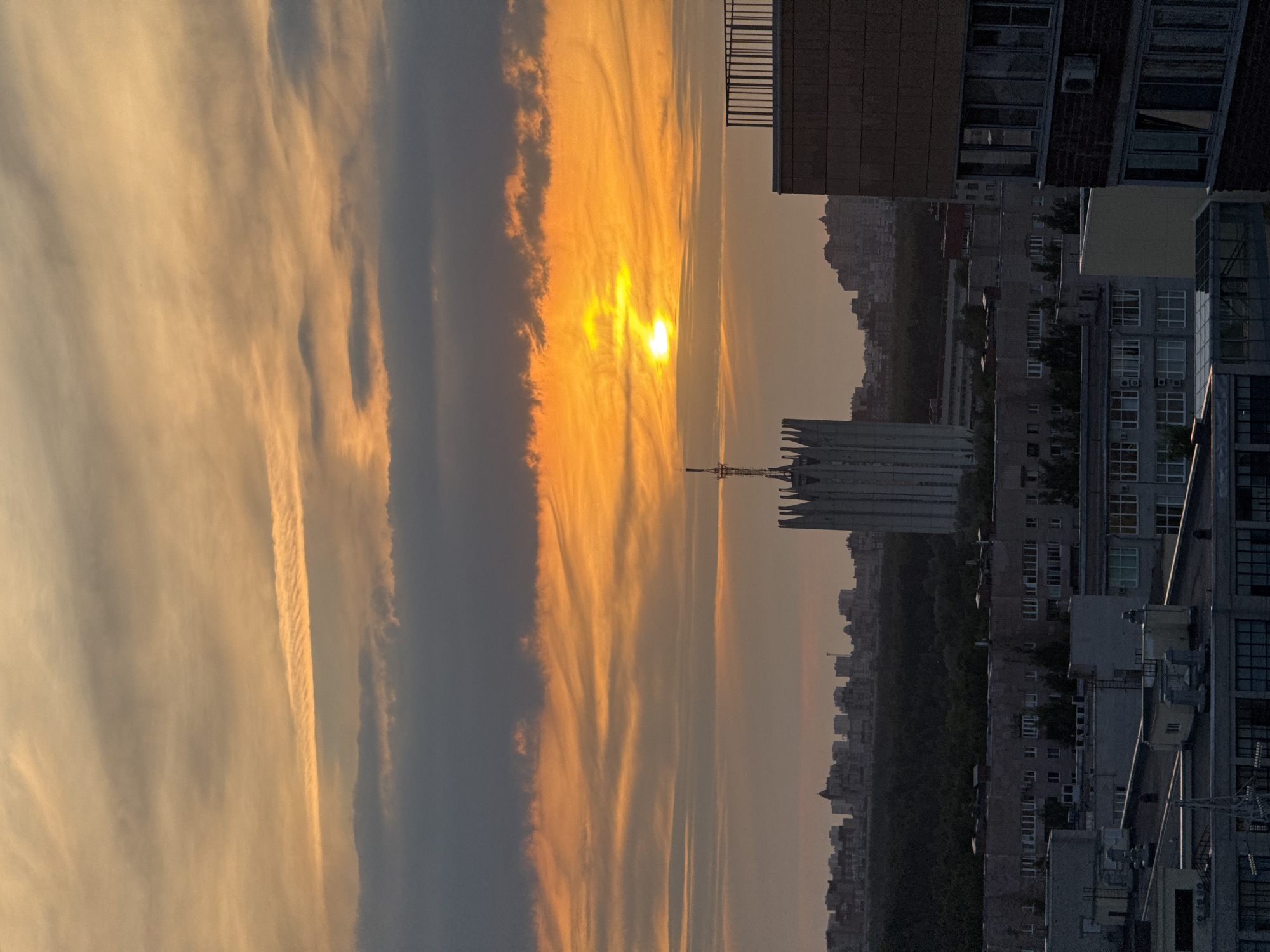 Dramatic Orange Sunset Illuminates Russian City Skyline