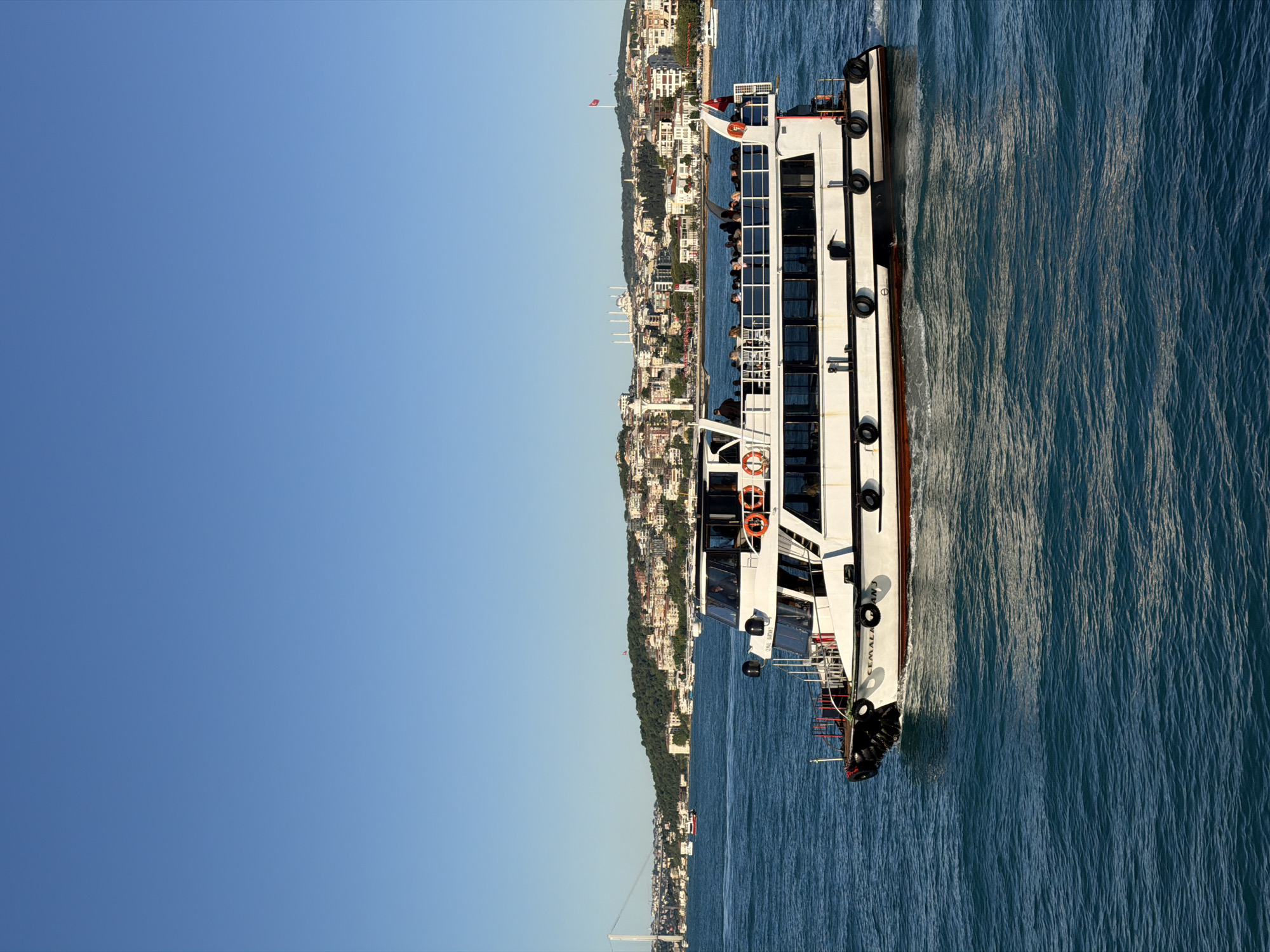 Ferry crosses Bosphorus in Beşiktaş district, Istanbul
