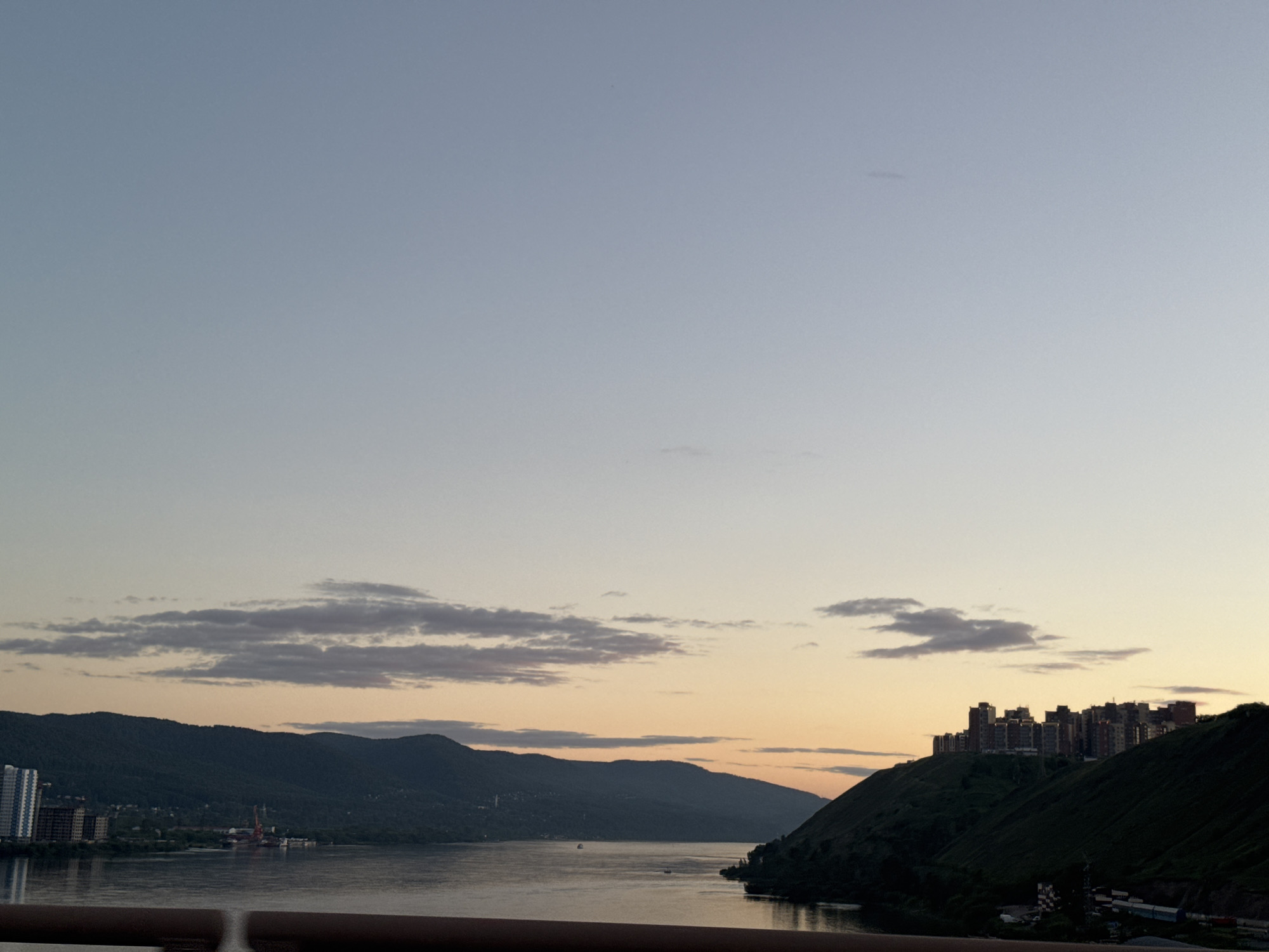 Krasnoyarsk at dusk, Yenisei River bridges under a pastel sky