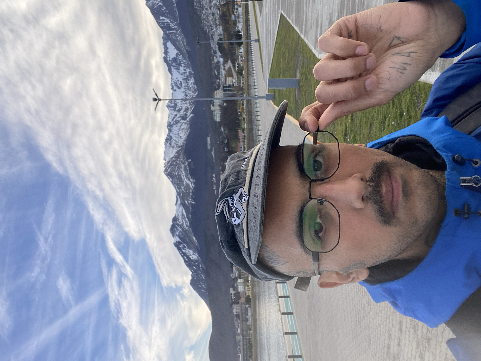 Tourist documents outdoor activities in scenic Ushuaia, Argentina