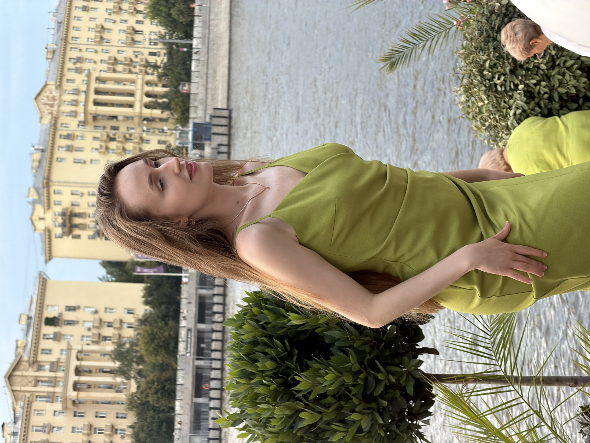 Waterfront scene in Moscow with flowers and city backdrop