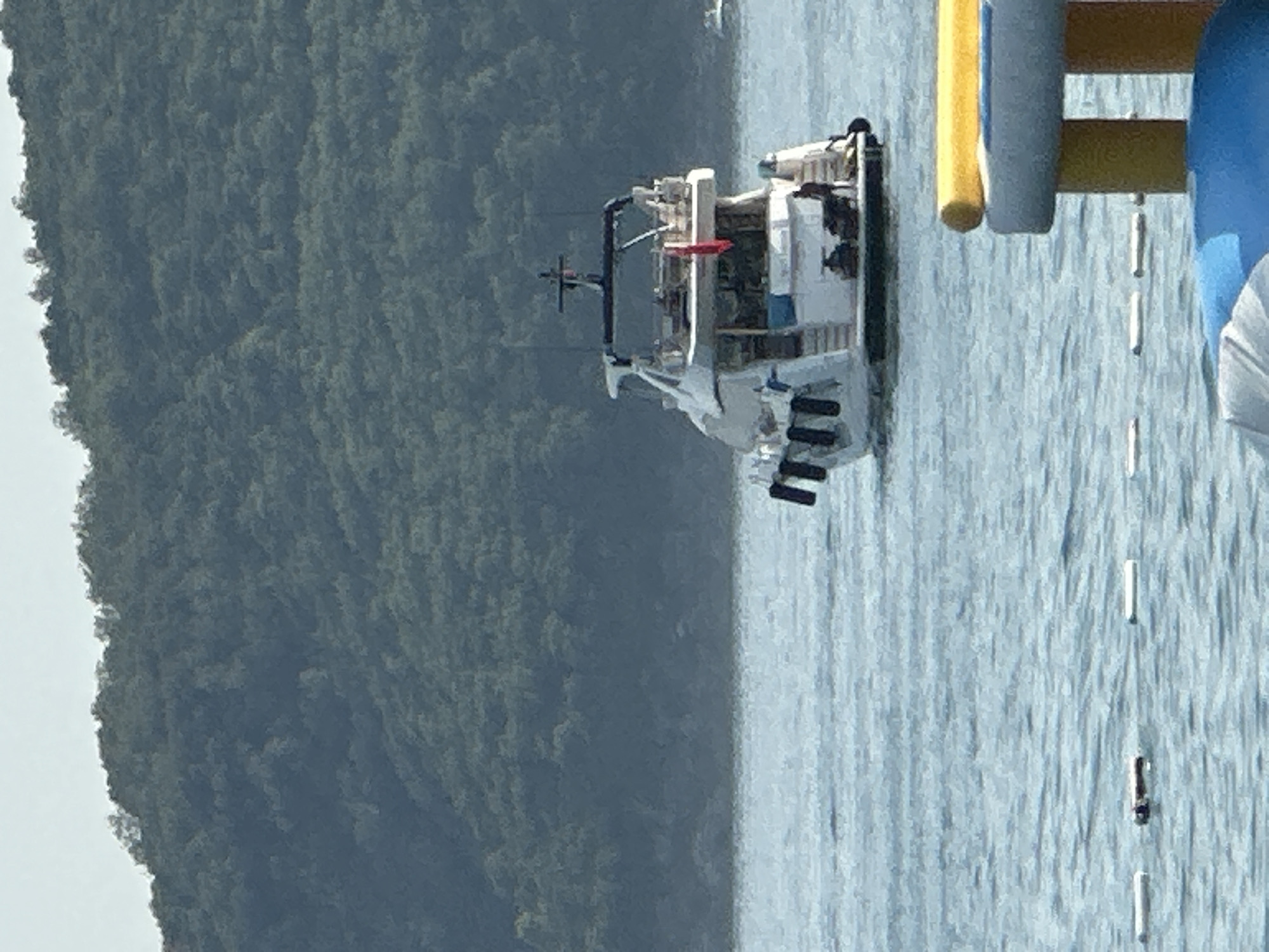 Yachts and speedboats on calm water near Boreti, Montenegro