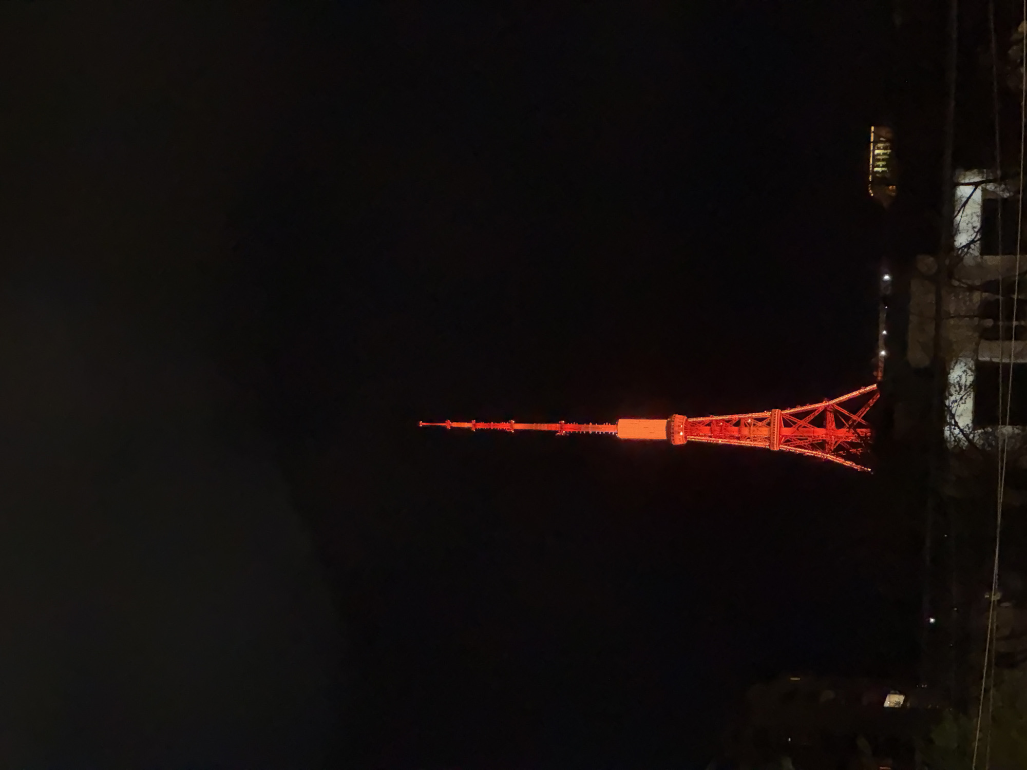 Nighttime scenes captured in Yerevan show illuminated tower, cloudy skies