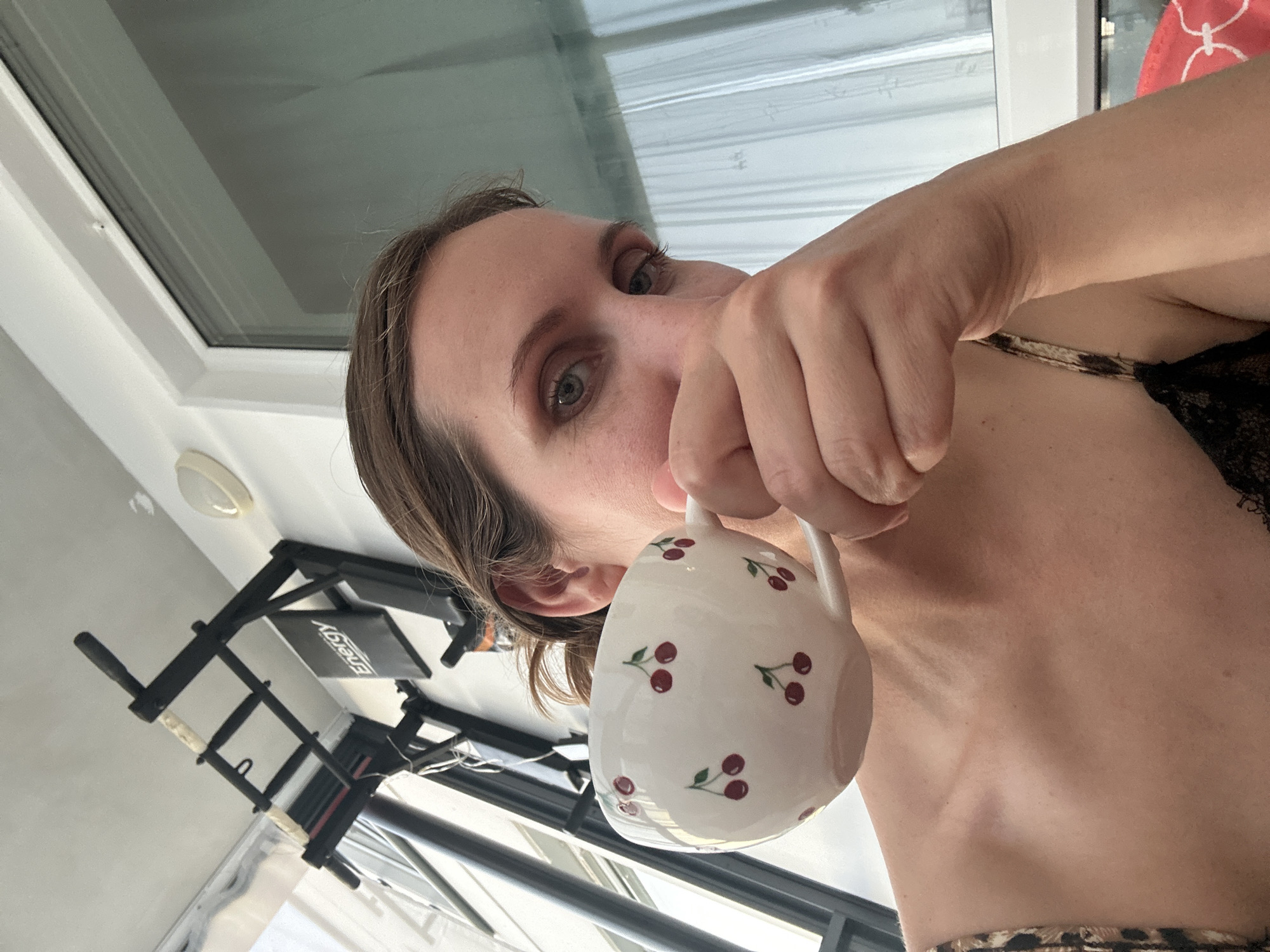 Afternoon tea at home in Vsevolozhsk, cherry-patterned ceramics featured