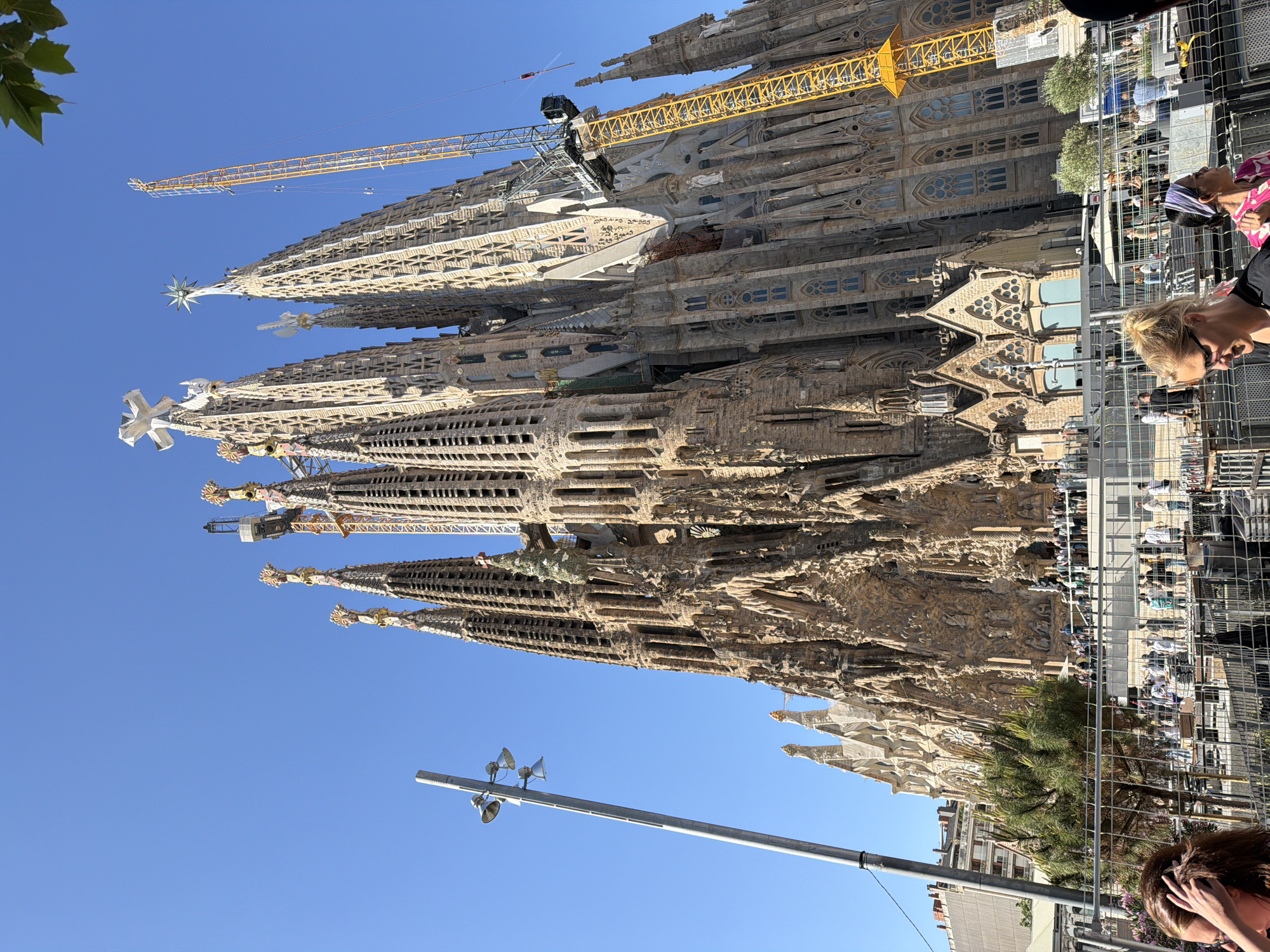 Tourists capture morning selfies at Barcelona's Sagrada Familia basilica
