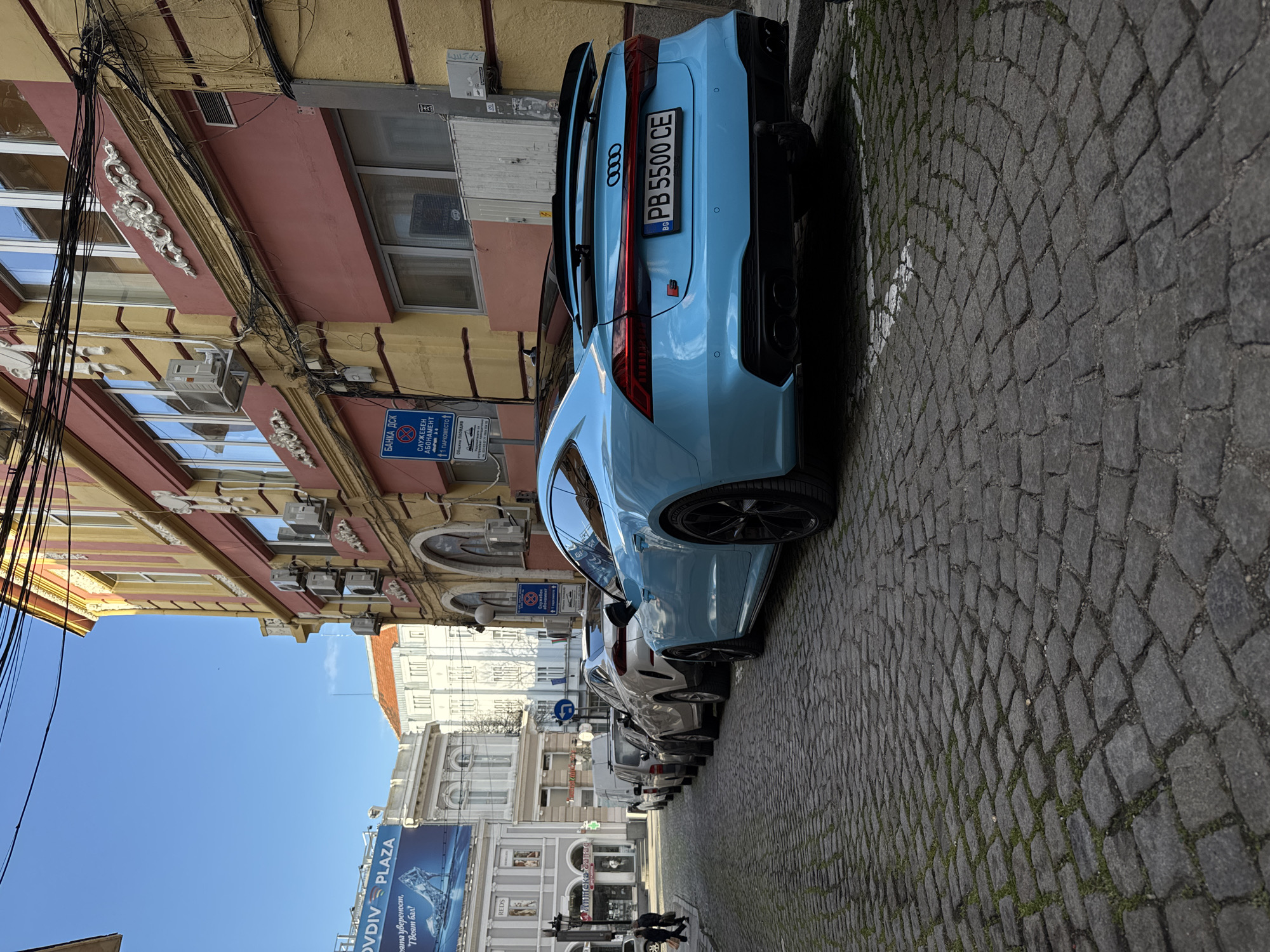 Street musician, candy shop visits, cat encounters captured in Plovdiv