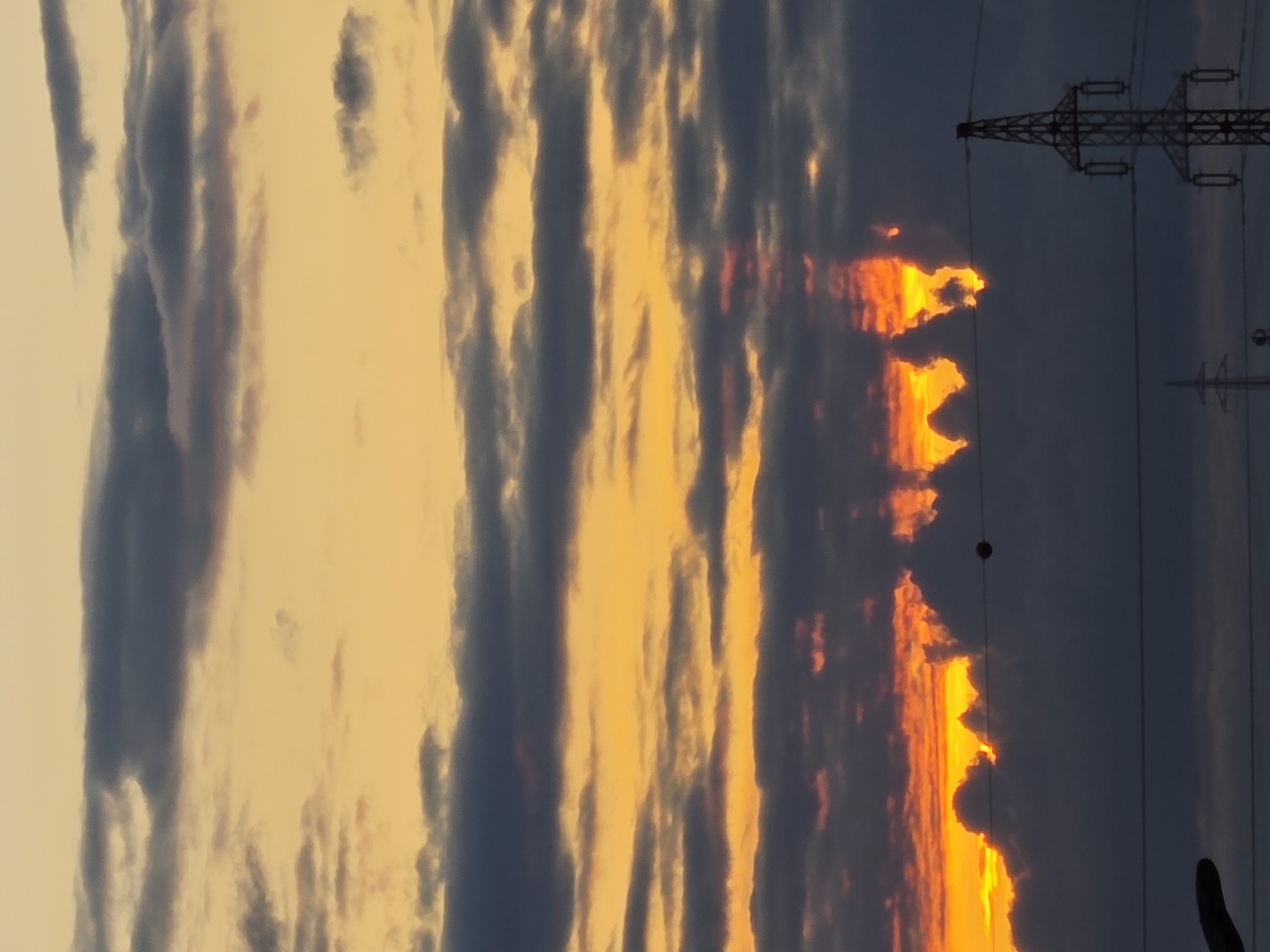 Dramatic sunset lights up Prague sky with fiery colors