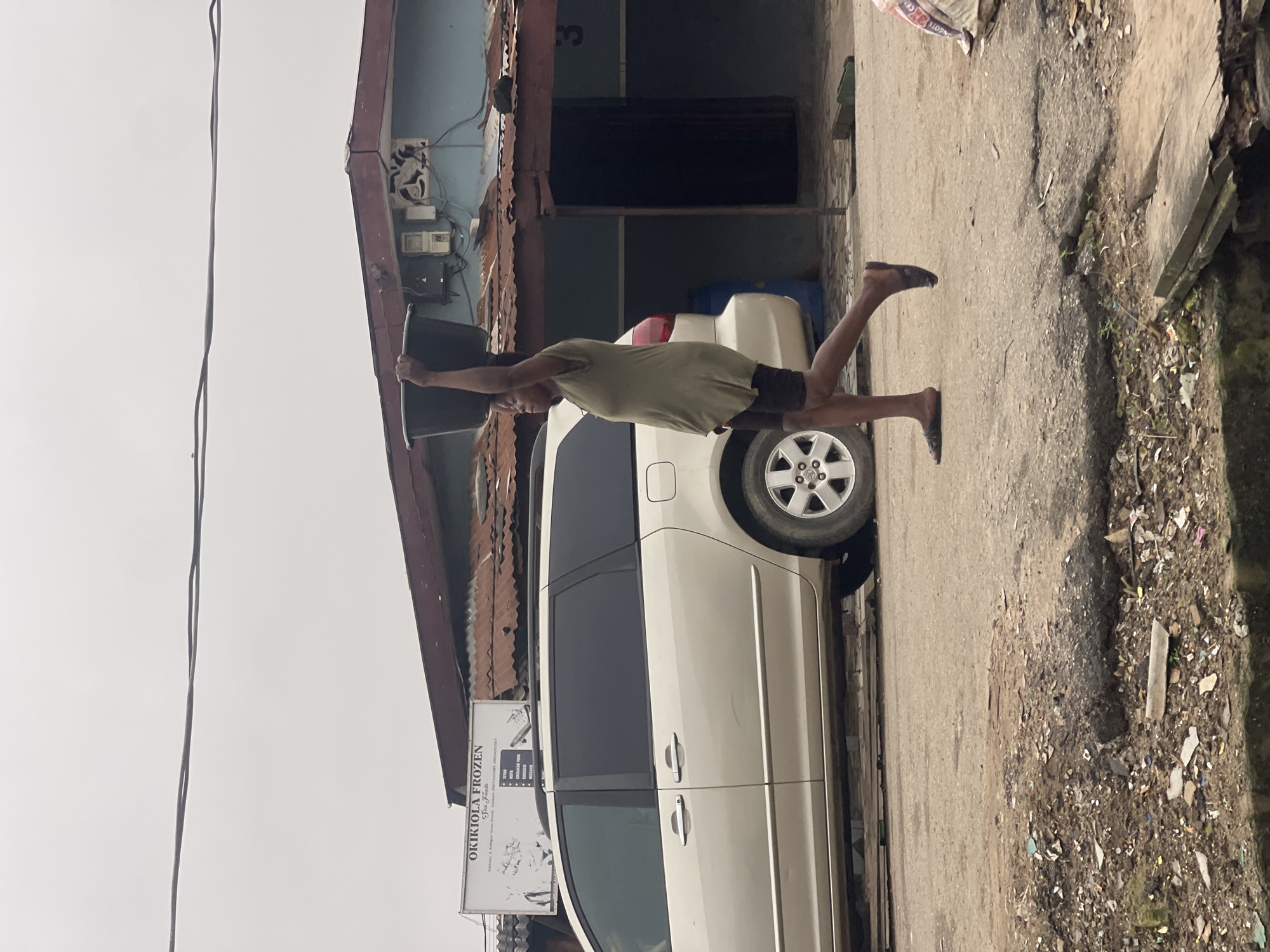 Morning street life and trade in Akowonjo, Lagos