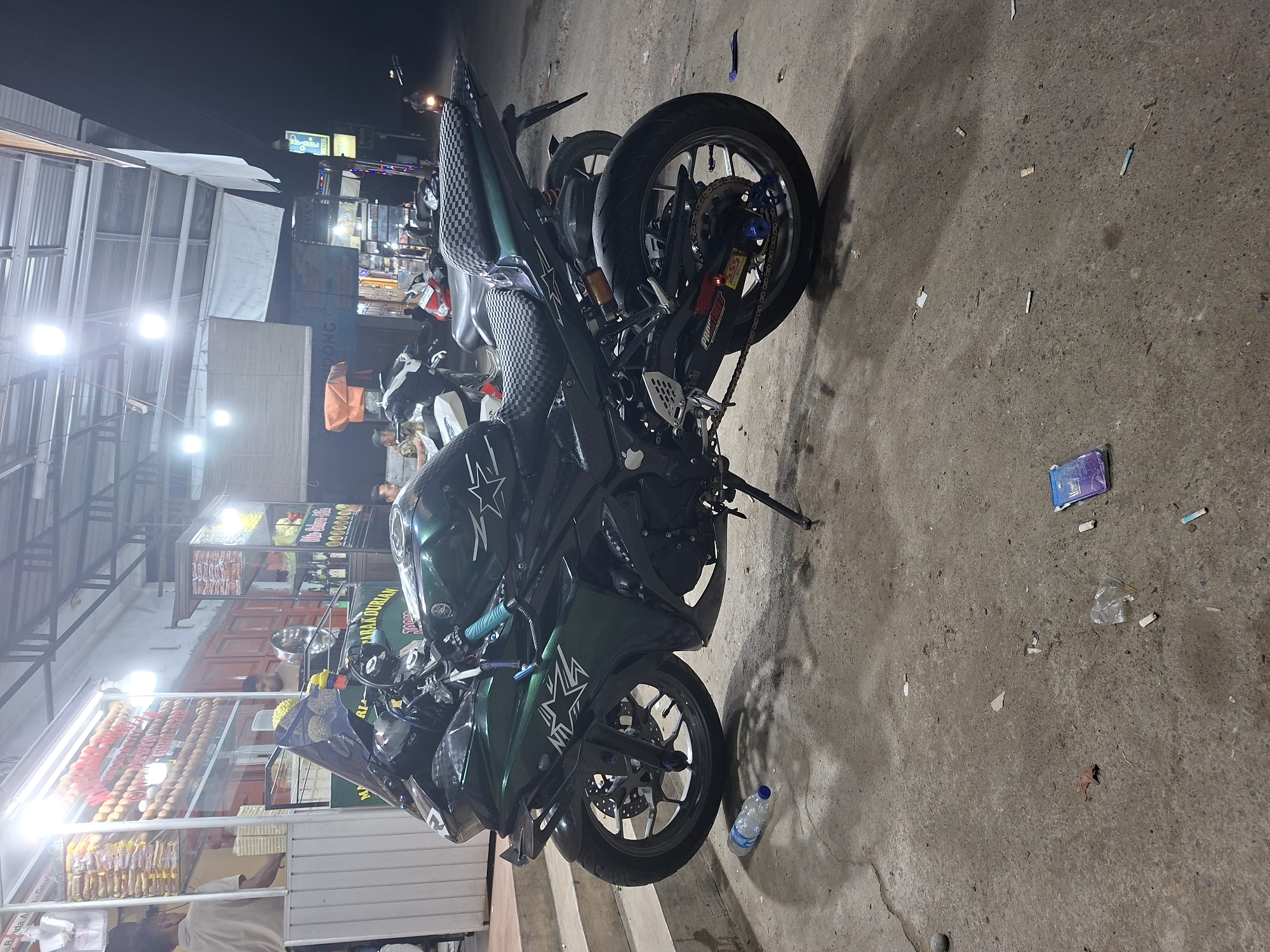 Motorcycle parked at food stall in Keudegeudong, Indonesia