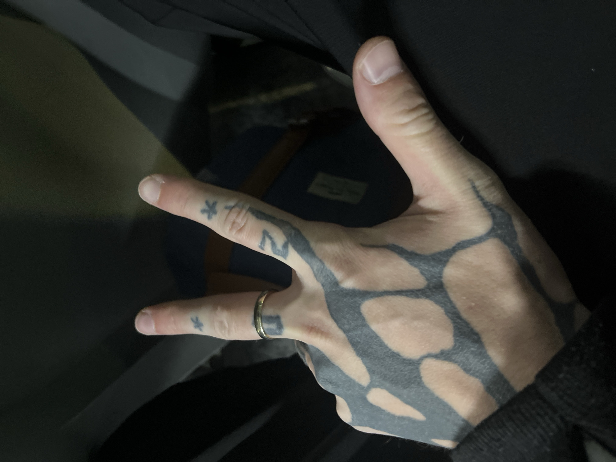 Tribal tattoo on hand documented in Cordoba, Argentina