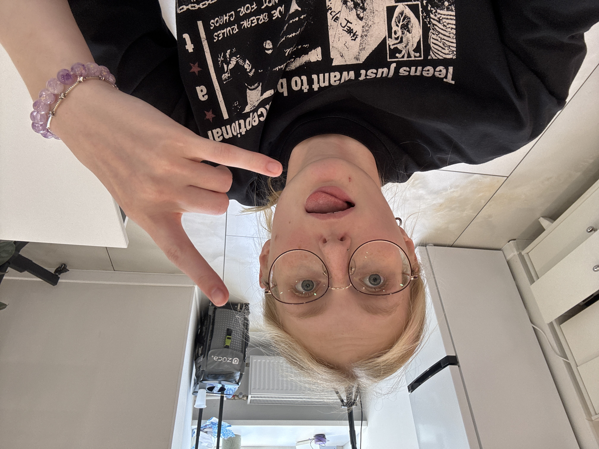 Selfies and desk life in a casual indoor setup